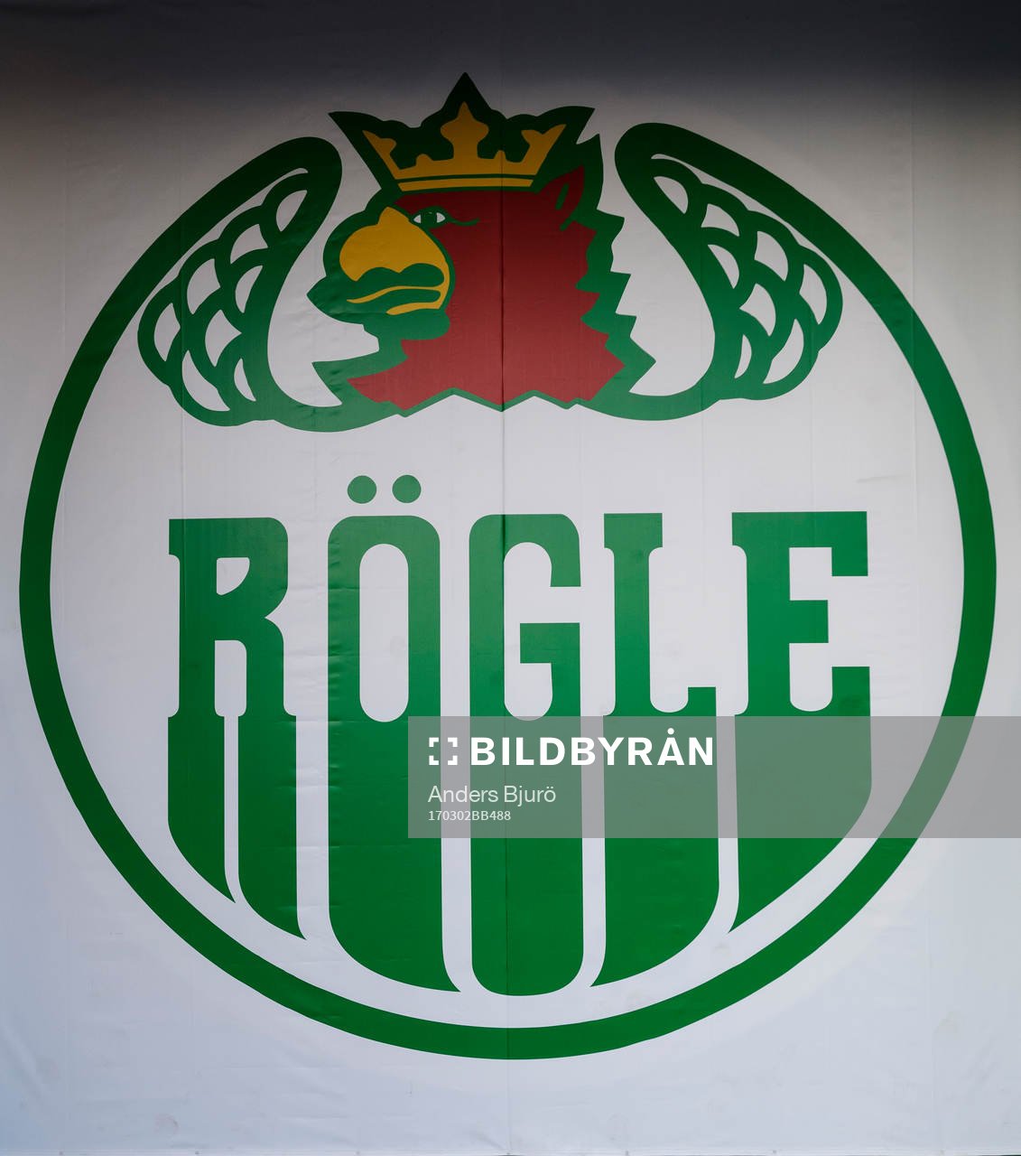 Rögles klubbmärke på en vägg