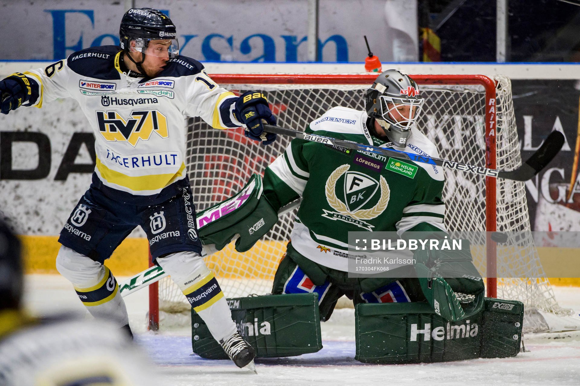 s Filip Sandberg  och Färjestads målvakt Stefan Steen