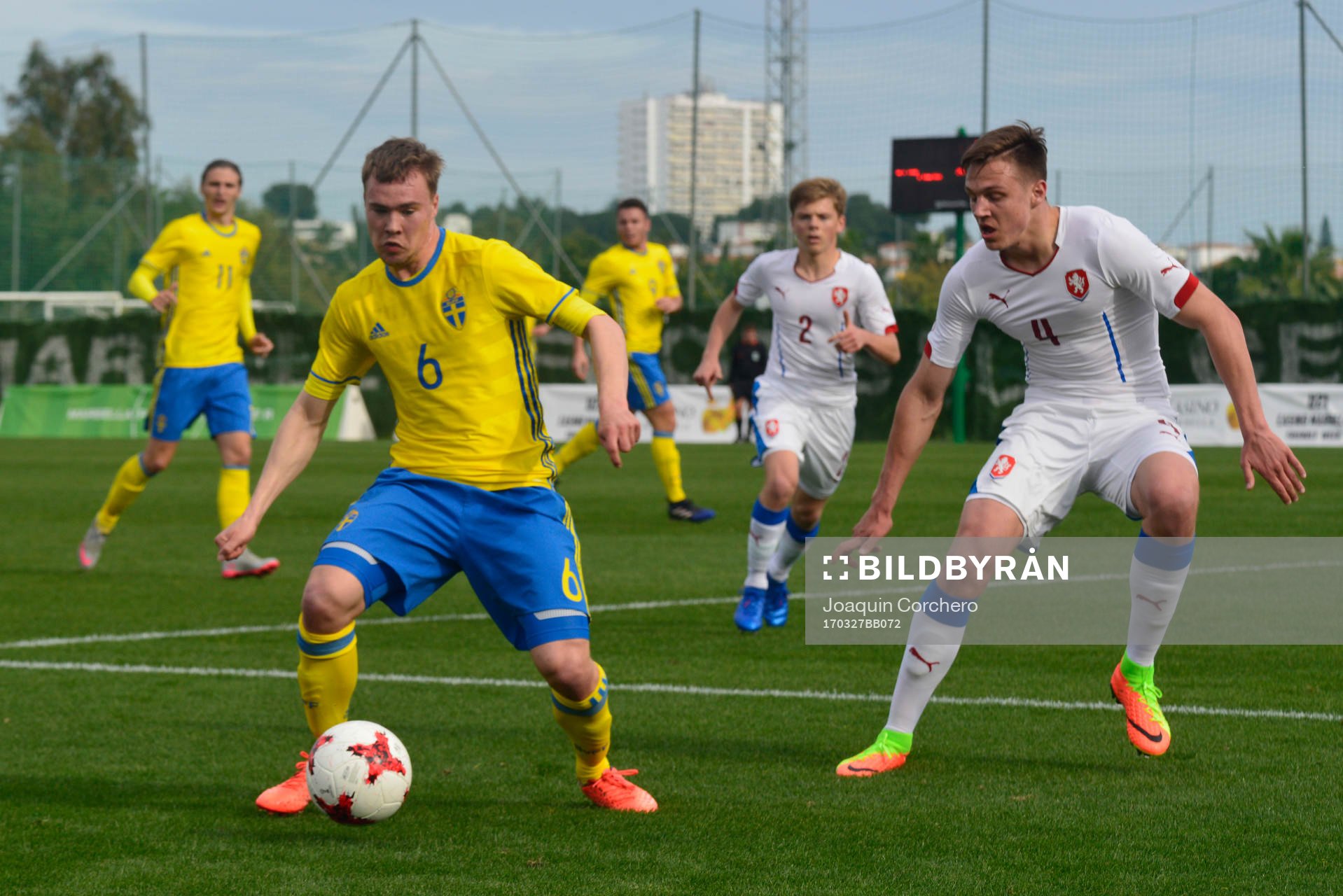 SIMON TIBBLING (6 SWEDEN) CONTROLS THE BALL