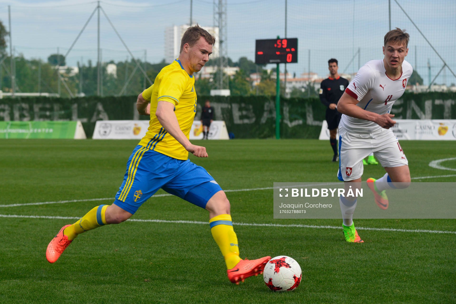 SIMON TIBBLING (6 SWEDEN) IS PREPARED TO KICK THE BALL