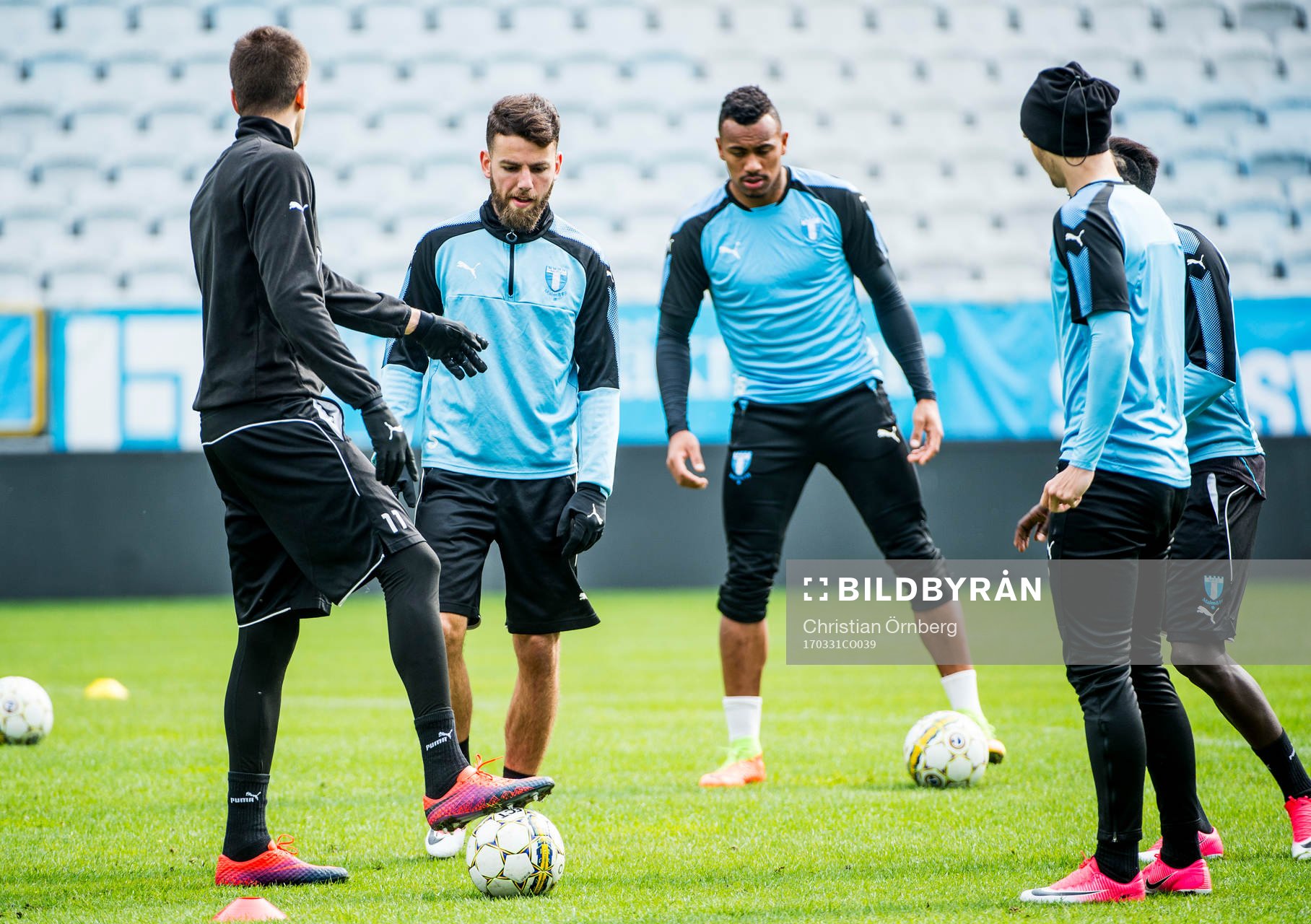 Erdal Rakip och Felipe Carvalho i mitten