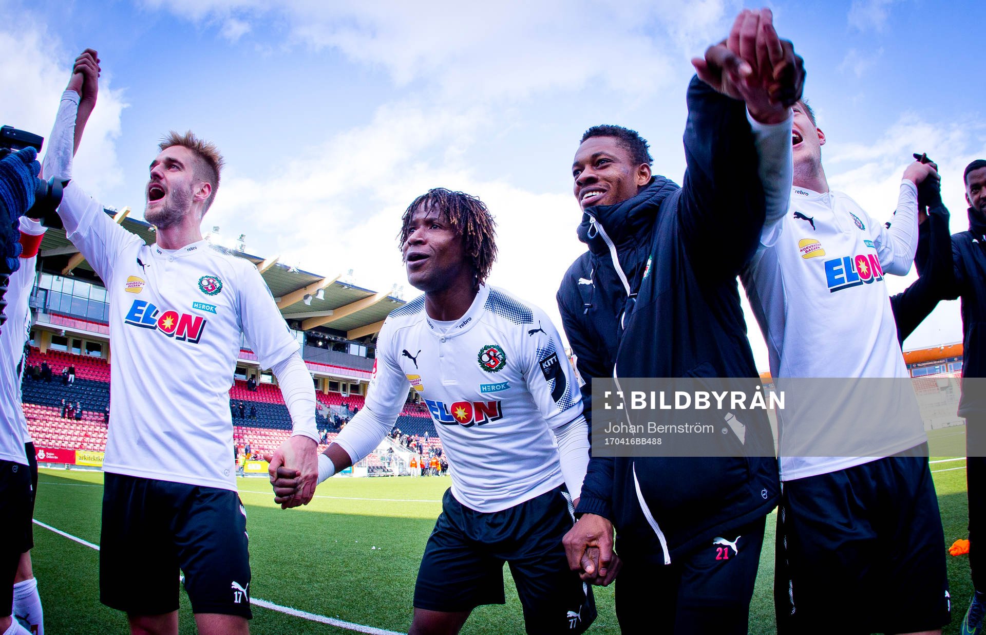 Örebros Johan Mårtensson, Kennedy Igboananike och Divine Naah  jublar framför fansen efter matchen under fotbollsmatchen i Allsvenskan mellan Örebro och Östersund den 16 april 2017 i Örebro.
