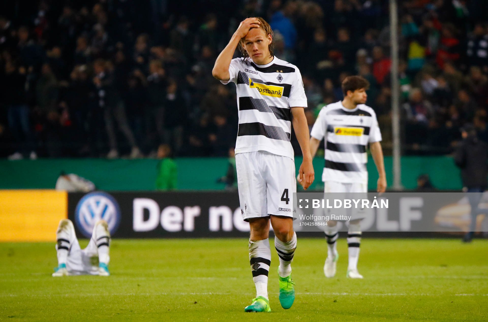 Football Soccer - Borussia Monchengladbach v Eintracht Frankfurt - DFB Pokal Semi Final - Borussia-Park, Monchengladbach, Germany - 25/4/17 Borussia Monchengladbach's Jannik Vestergaard looks dejected after losing the match with a penalty shootout Reuters / Wolfgang Rattay Livepic DFL RULES TO LIMIT THE ONLINE USAGE DURING MATCH TIME TO 15 PICTURES PER GAME. IMAGE SEQUENCES TO SIMULATE VIDEO IS NOT ALLOWED AT ANY TIME. FOR FURTHER QUERIES PLEASE CONTACT DFL DIRECTLY AT + 49 69 650050 DFB RULES PROHIBIT USE IN MMS SERVICES VIA HANDHELD DEVICES UNTIL TWO HOURS AFTER A MATCH AND ANY USAGE ON INTERNET OR ONLINE MEDIA SIMULATING VIDEO FOOTAGE DURING THE MATCH.