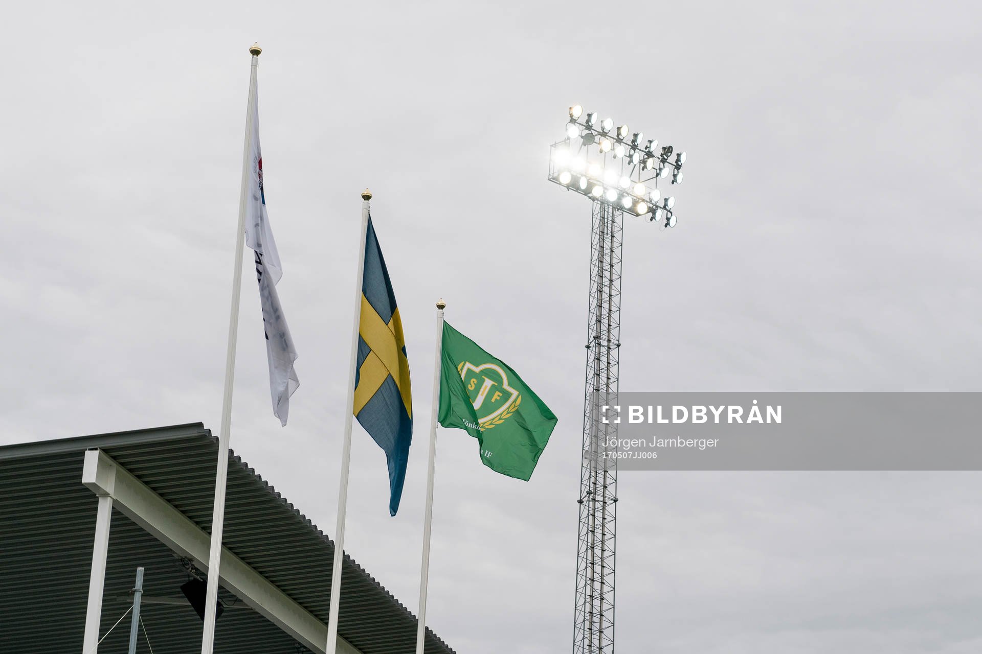 Elljus med Jönköpings flagga i förgrunden