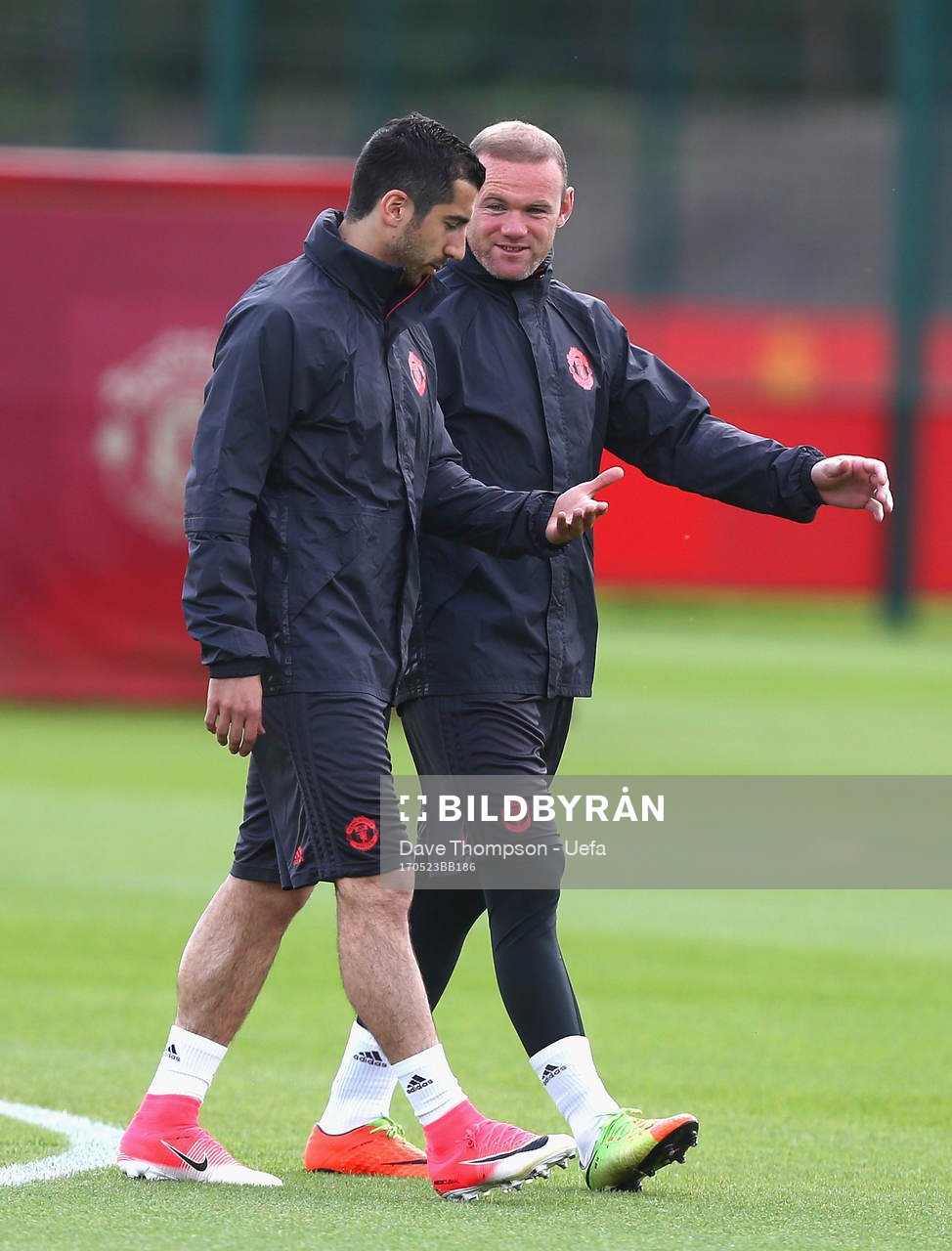 Wayne Rooney of Manchester United and Henrikh Mkhitaryan of