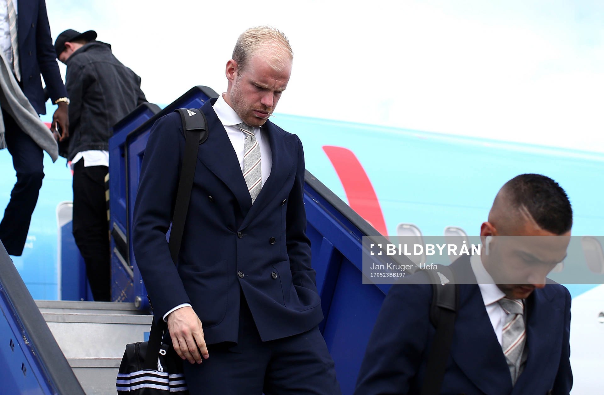 Davy Klaassen(L) and Hakim Ziyech of Ajax arrive