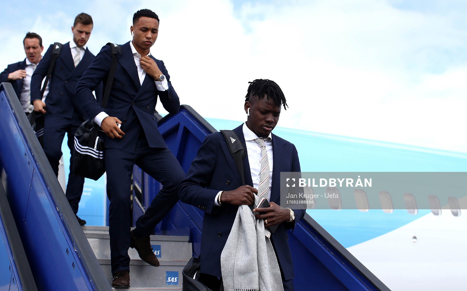 Bertrand Traore of Ajax arrives with team mates