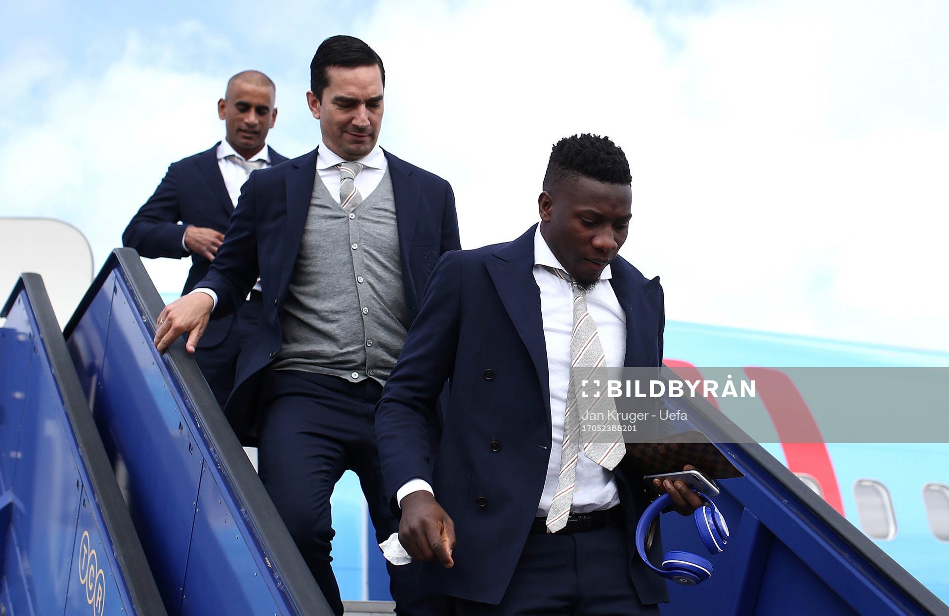 Andre Onana of Ajax arrives with team mates