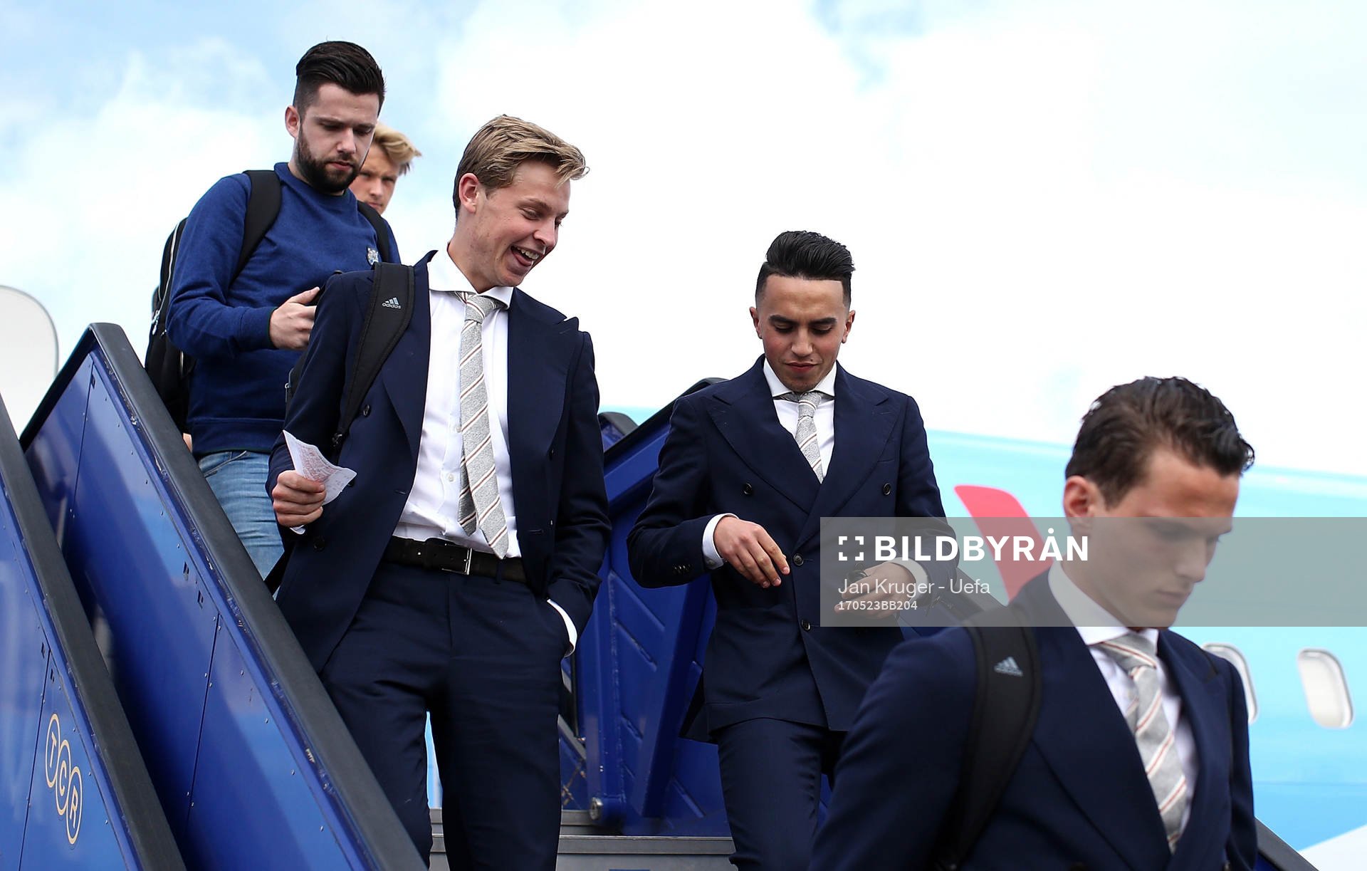 Frenkie de Jong(L) and ahead Abdelhak Nouri of Ajax arrive