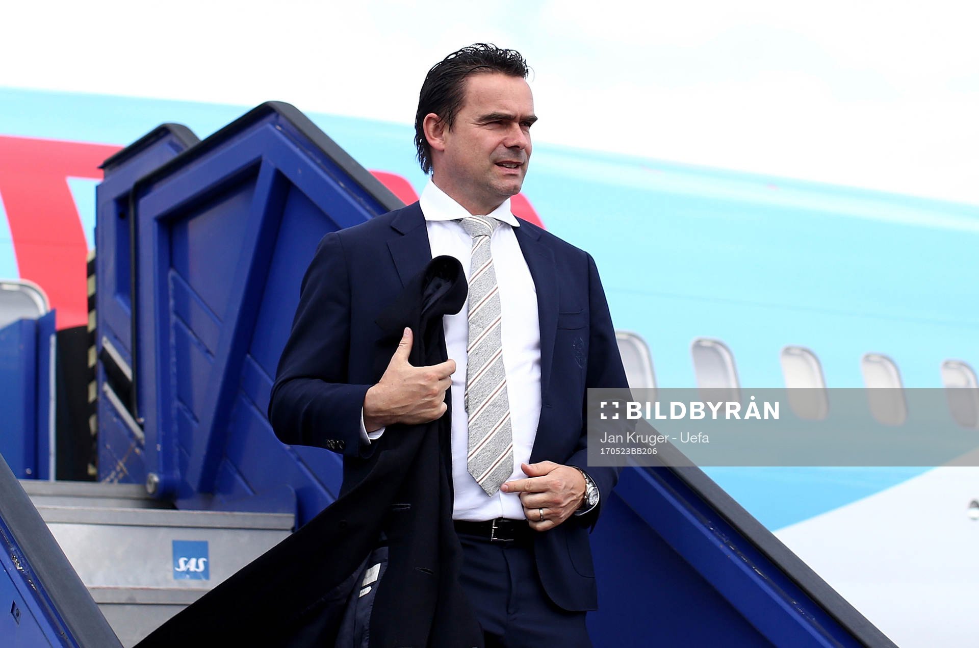 Marc Overmars arrives with the team