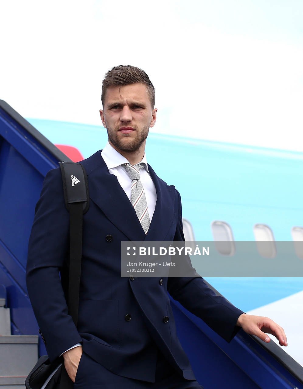 Joel Veltman of Ajax arrives with team mates