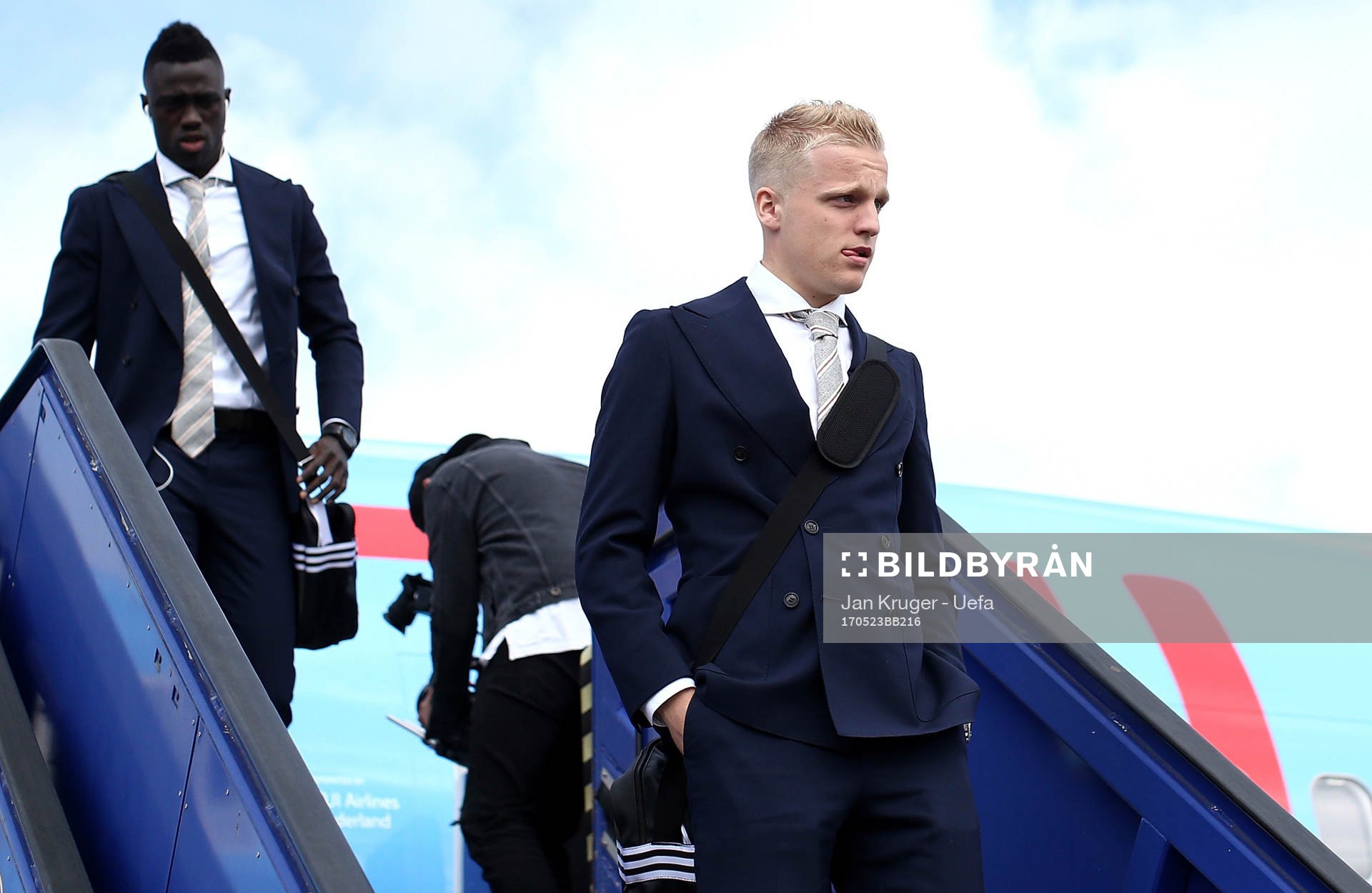 Donny van de Beek of Ajax arrives with team mates
