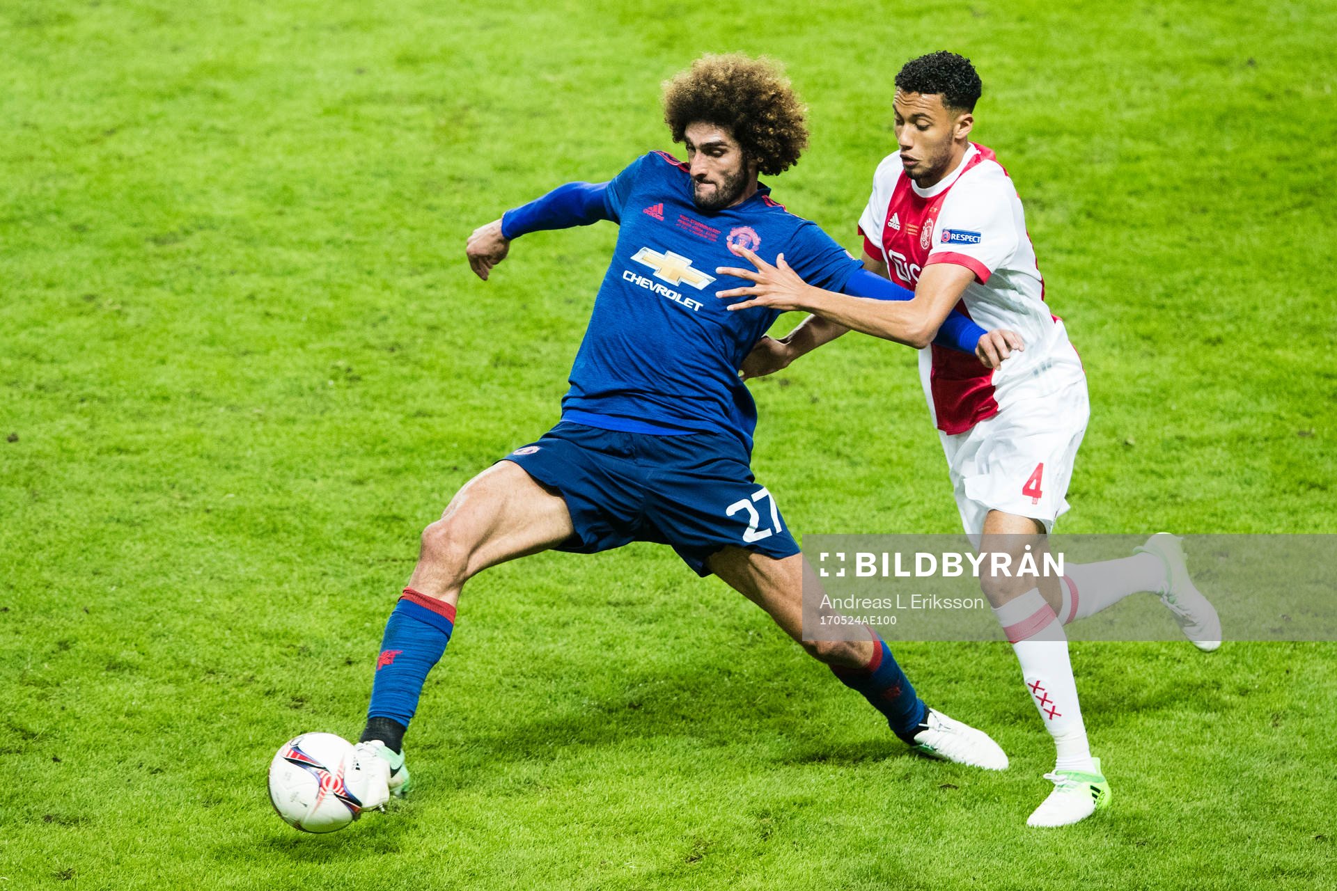Manchester Uniteds Marouane Fellaini och Ajax Jairo