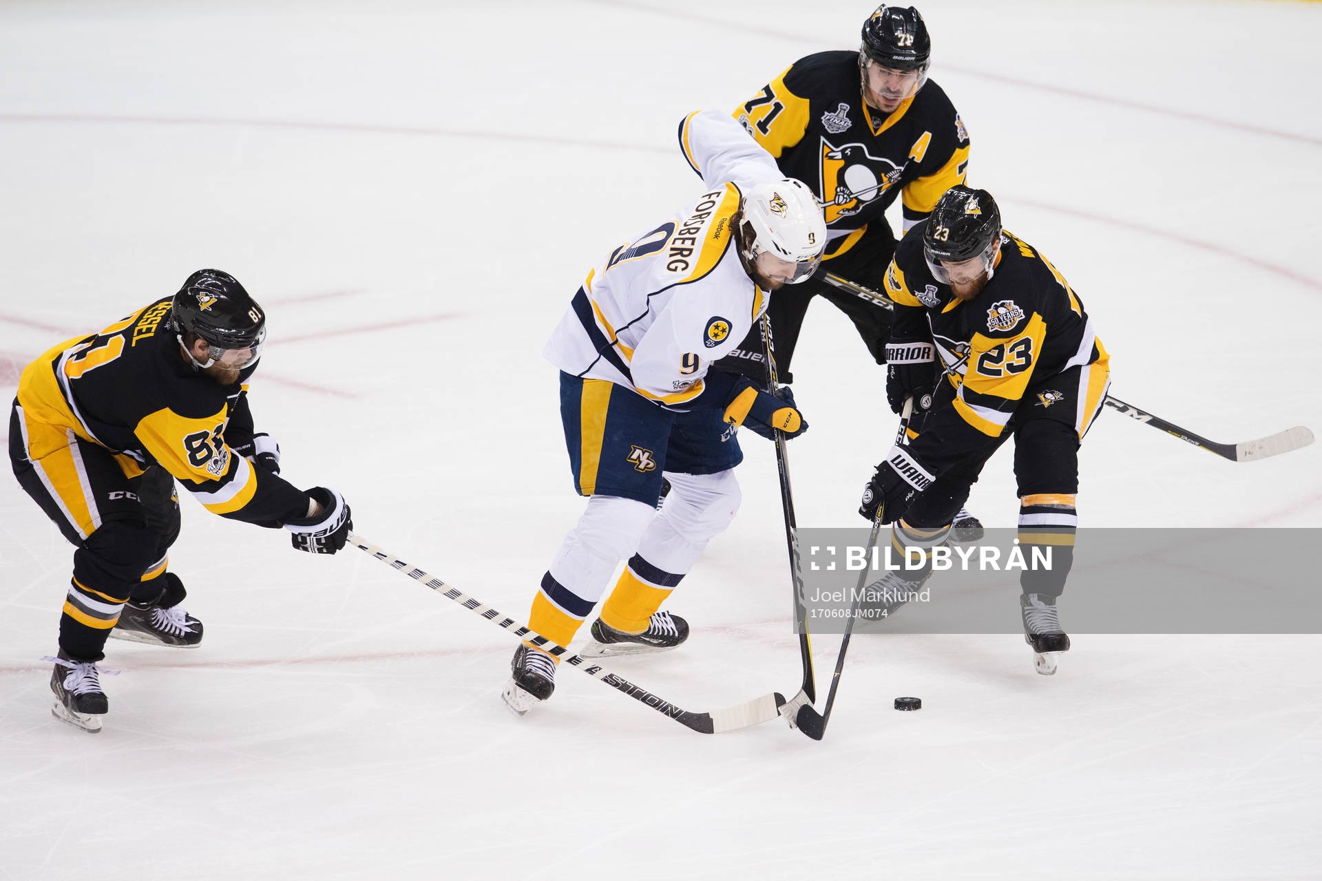 Pittsburghs Phil Kessel, Evgeni Malkin och Scott Wilson