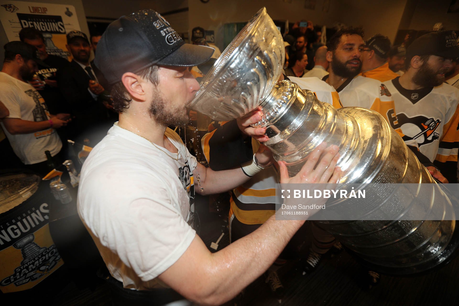 Captain Sidney Crosby #87 of the Pittsburgh Penguins drinks