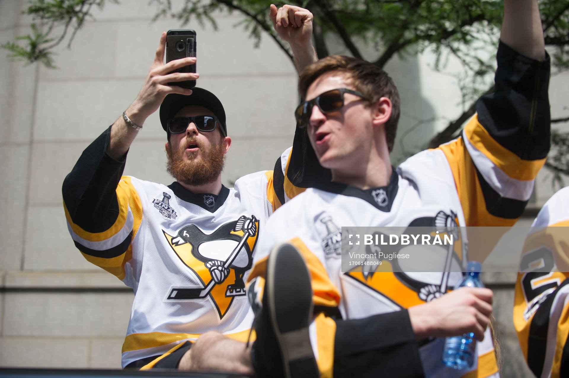 Pittsburgh Penguins' Tom Kuhlhachl (left)