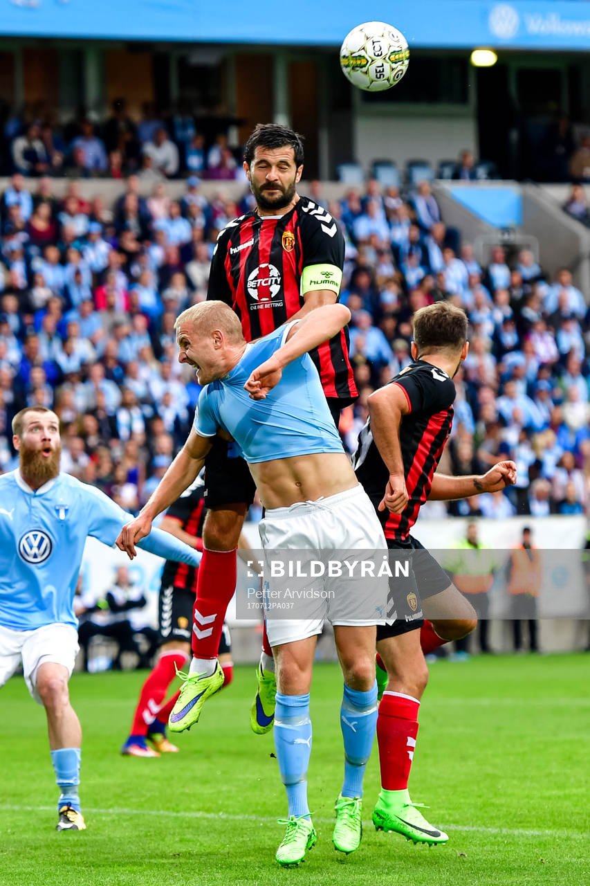 Malmö FFs Franz Brorsson och Vardars Boban Grncharov under fotbollsmatchen i kvalet till Champions League mellan Malmö FF och Vardar den 12 juli 2017 i Malmö.