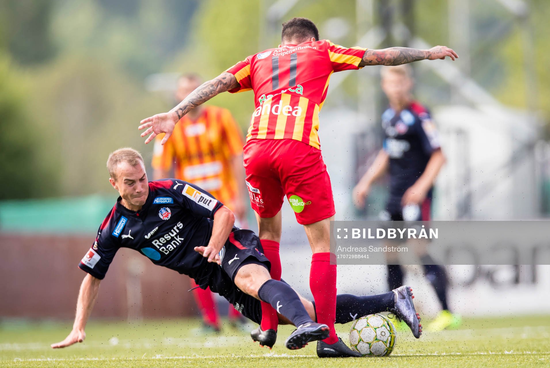 Helsingborgs Carl Wede i kamp om bollen med Syrianskas Charbel Georges under fotbollsmatchen i Superettan mellan Syrianska och Helsingborg den 29 Juli 2017 i Södertälje.
