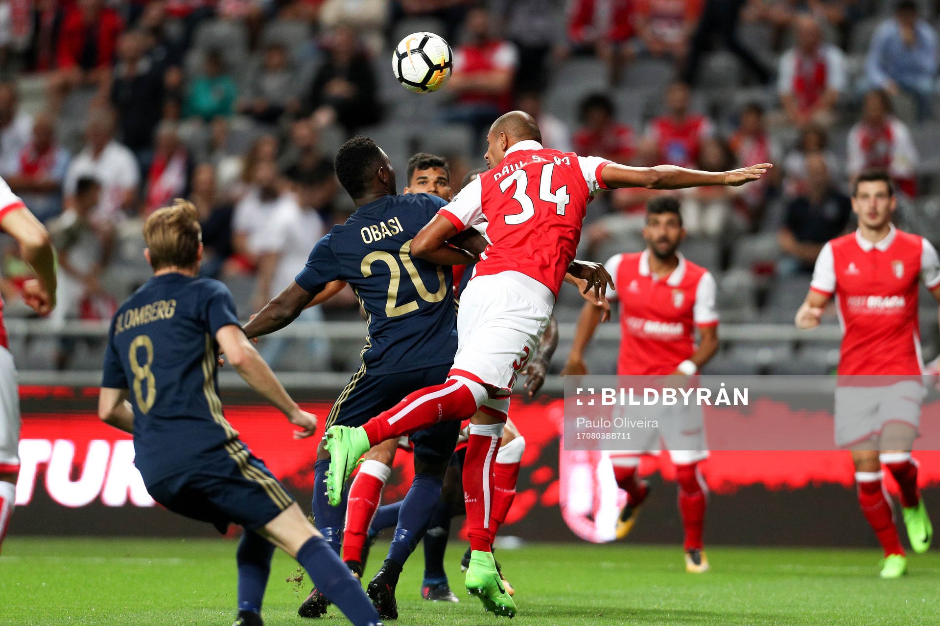Chinedu Obasi forward of AIK (R) vies with Raul Silva