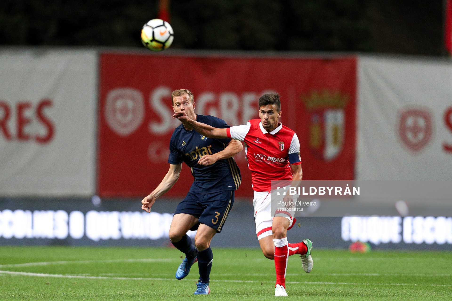 Per Karlsson defender of AIK (L) vies with Rui Fonte