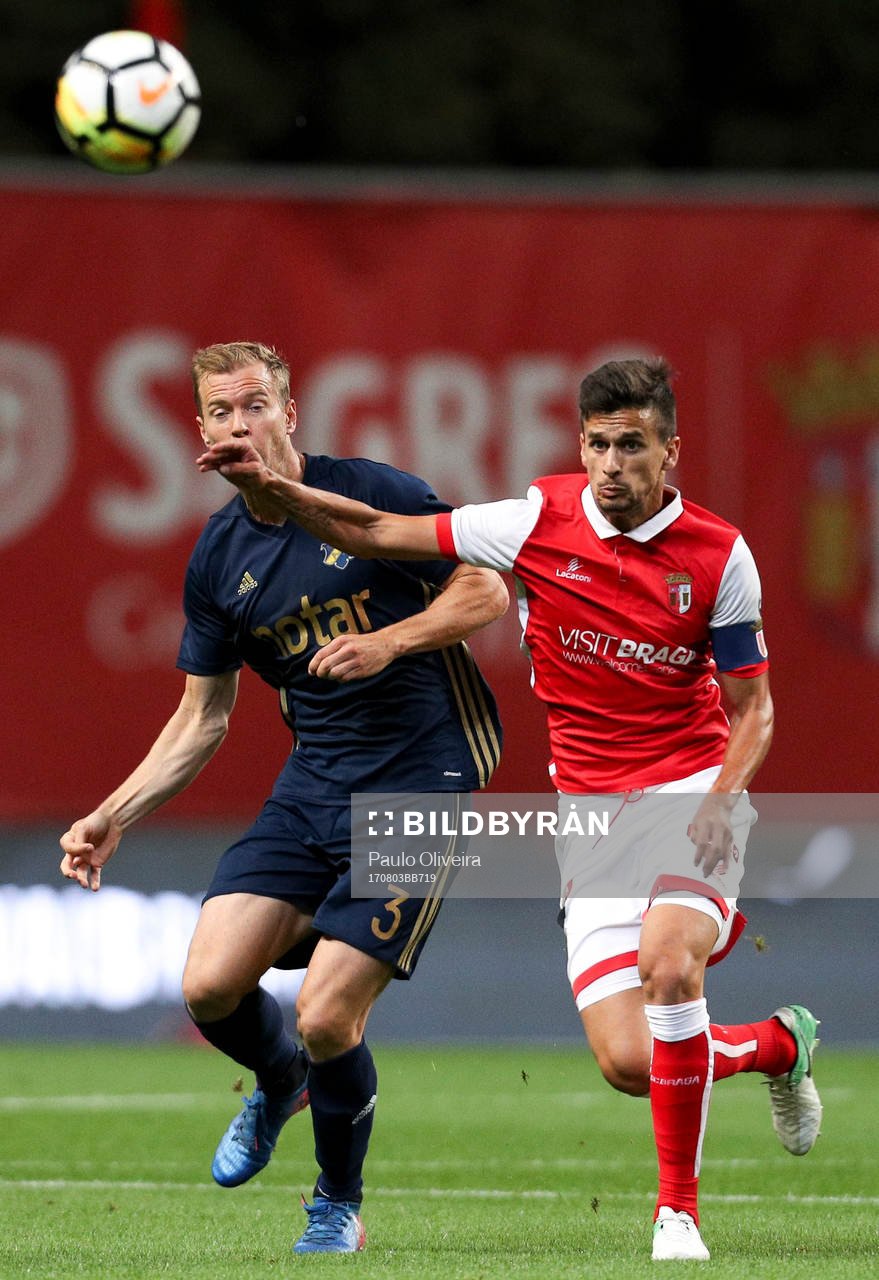 Per Karlsson defender of AIK (L) vies with Rui Fonte