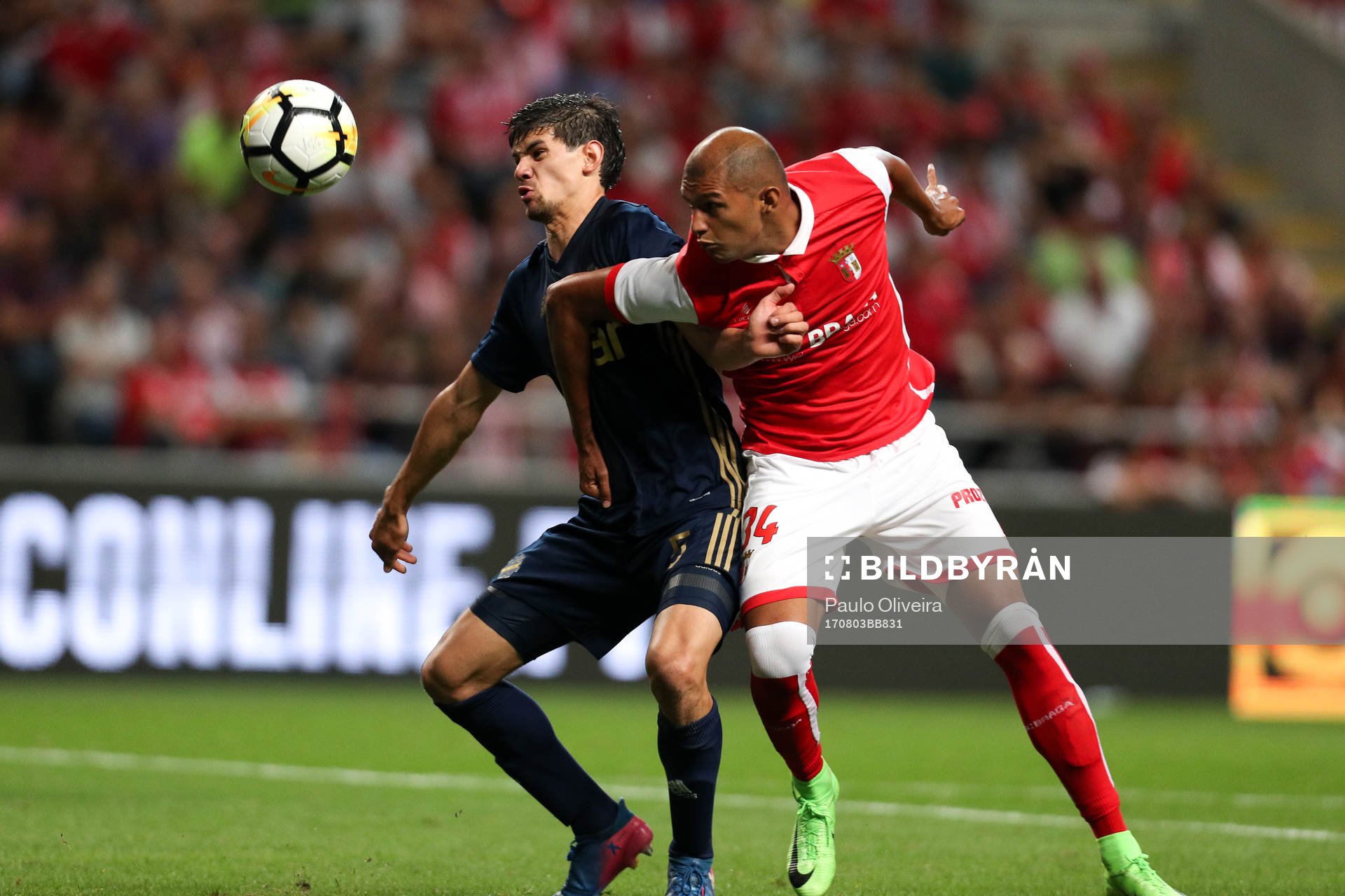 Jesper Nyholm defender of AIK (L) vies with Raul Silva