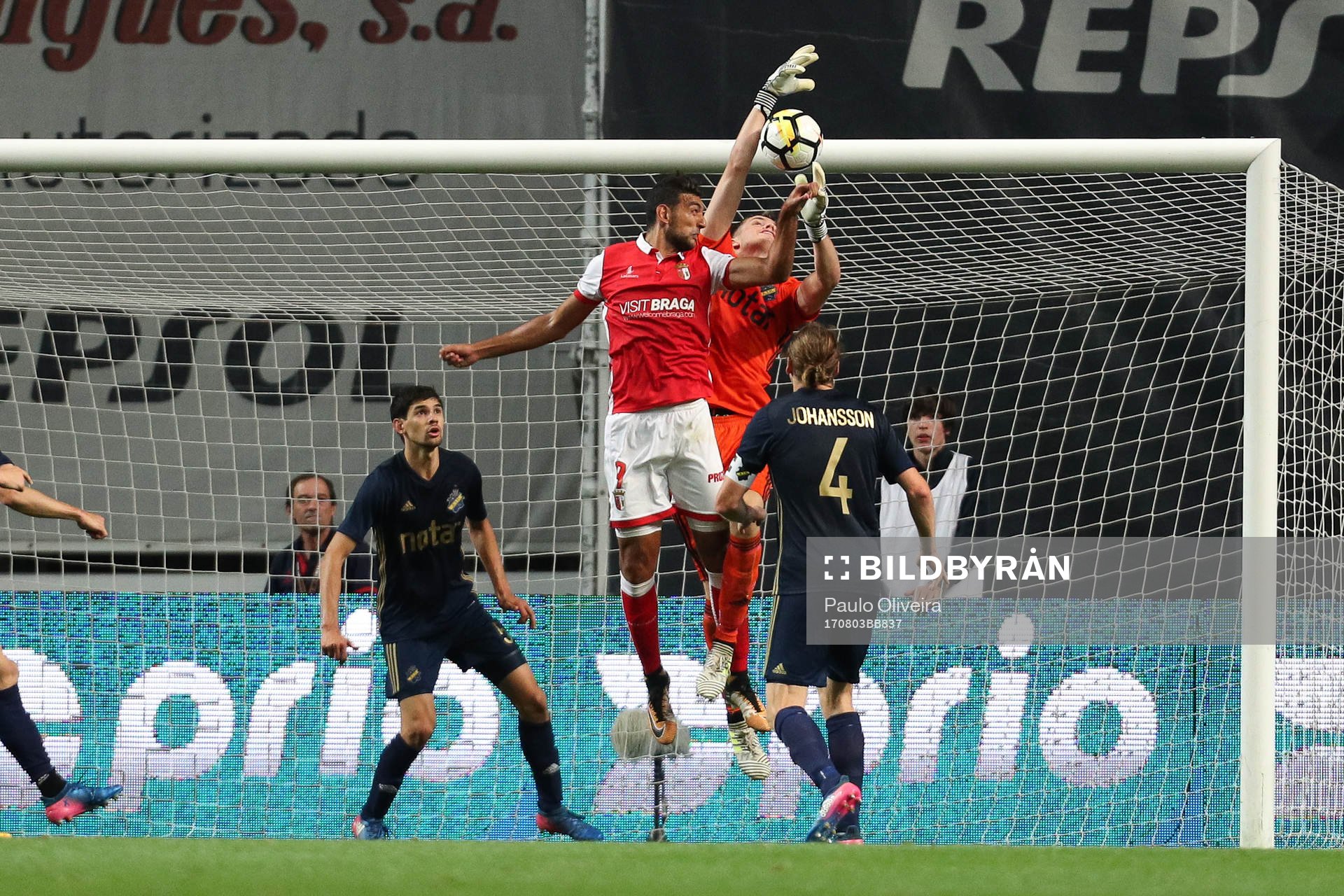 Ahmed Hassan forward of SC Braga (C) vies with Oscar Linner