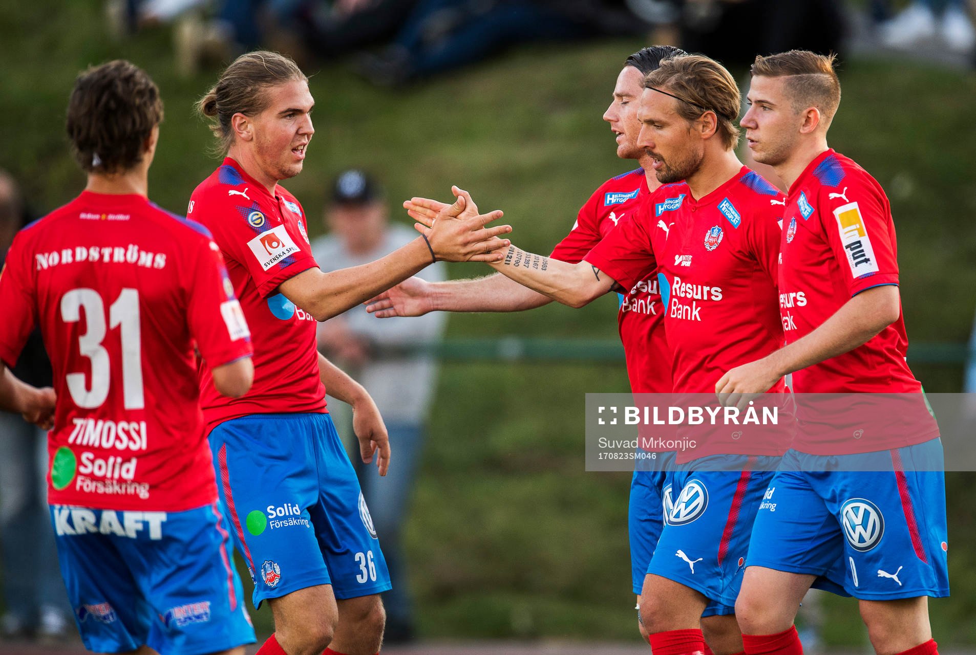 Helsingborgs Martin Christensen (tvåa från höger) jublar