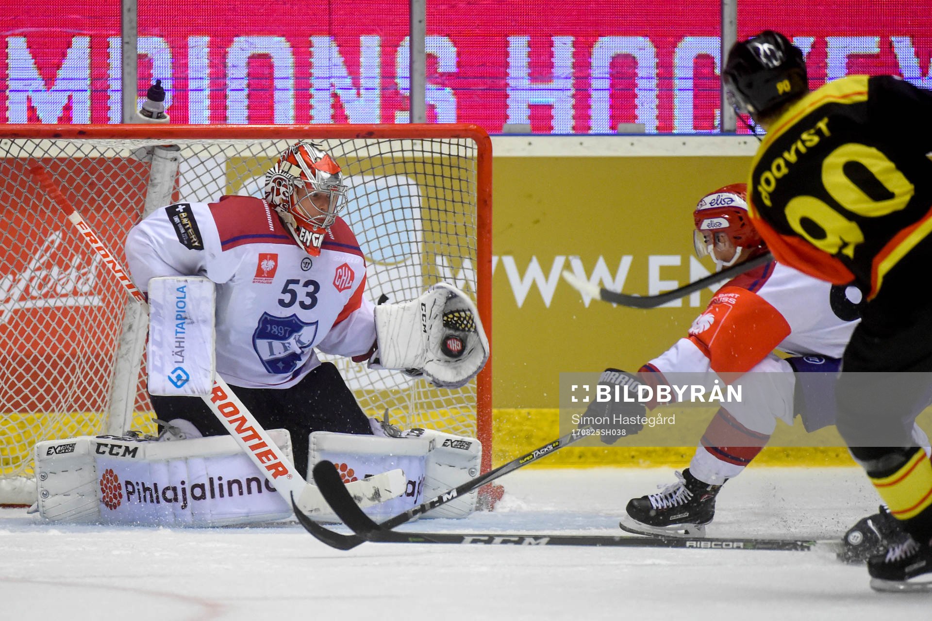 Jesper Boqvist of Brynäs shoots and Goalkeeper Atte Engren