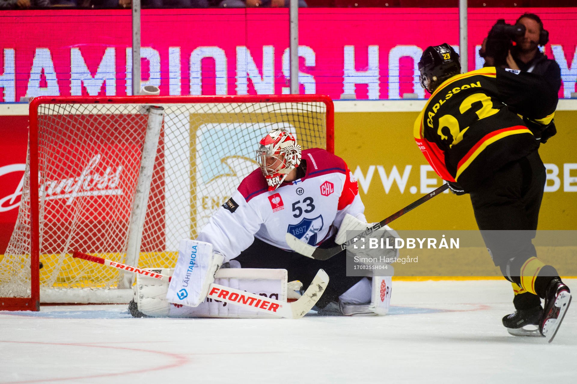 Lucas Carlsson of Brynäs scores a penalty shot behind