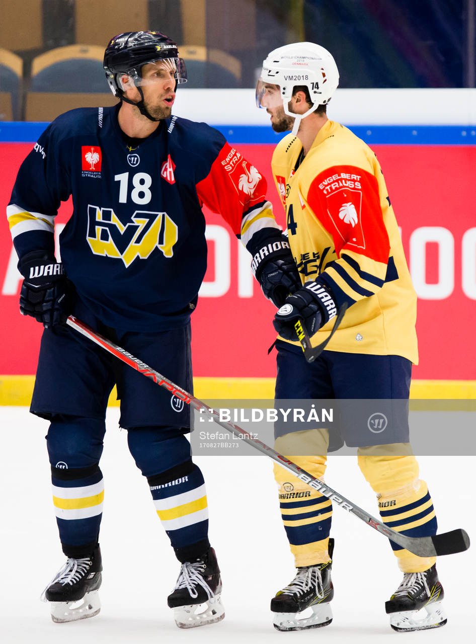 Topi Jaakola of HV71 and Alexis Loiseau of Esbjerg in a