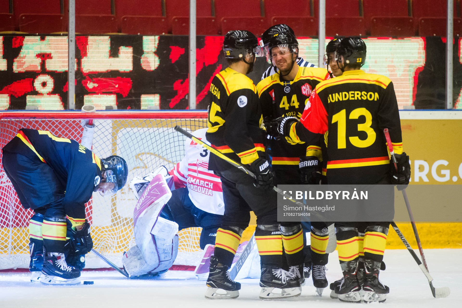 Jacob Blomqvist of Brynäs celebrates with Louie Caporusso