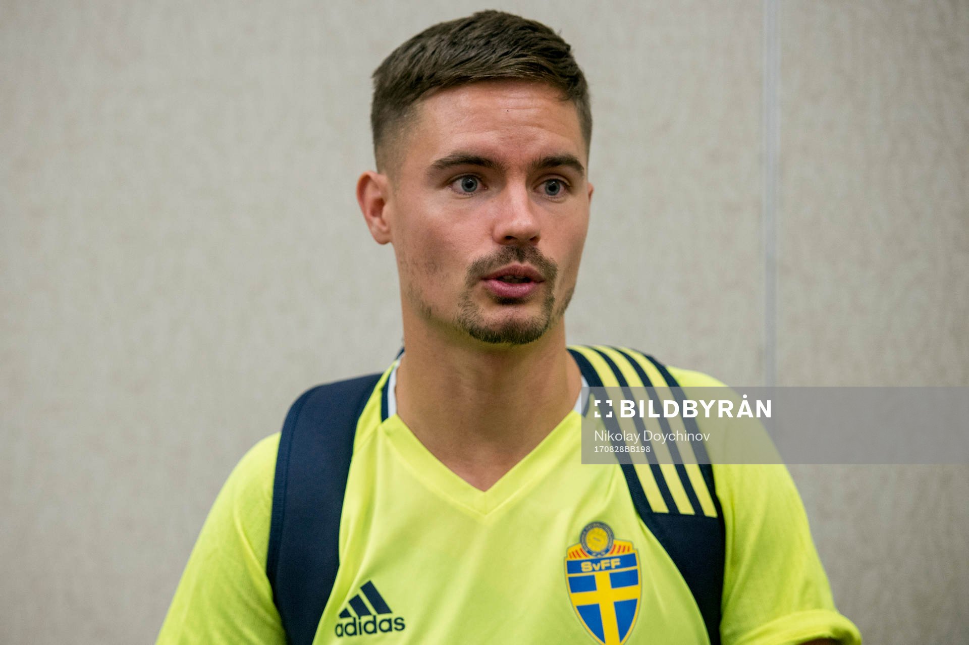 Swedish player Mikael Lustig meets media at a Mixed Zone