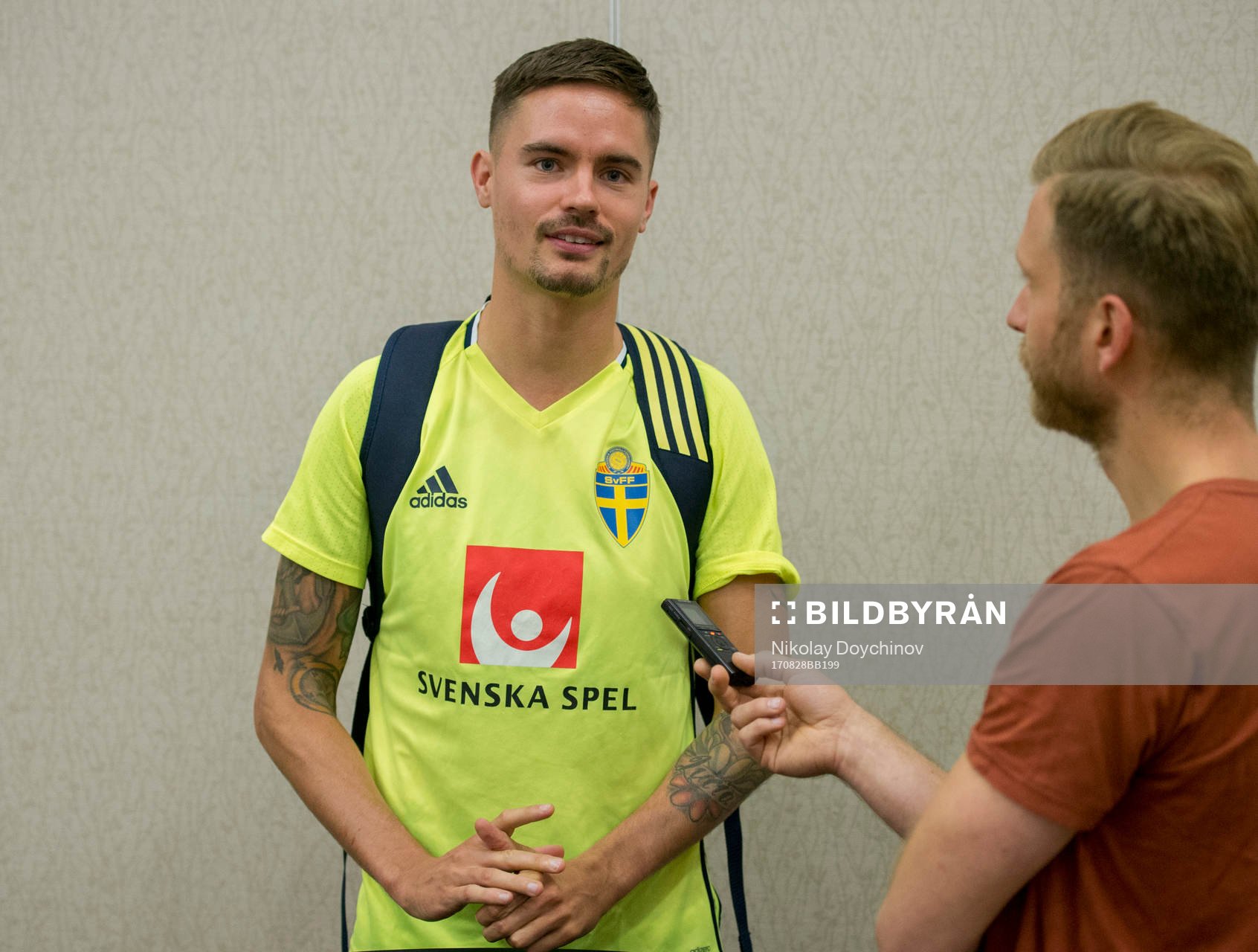 Swedish player Mikael Lustig meets media at a Mixed Zone