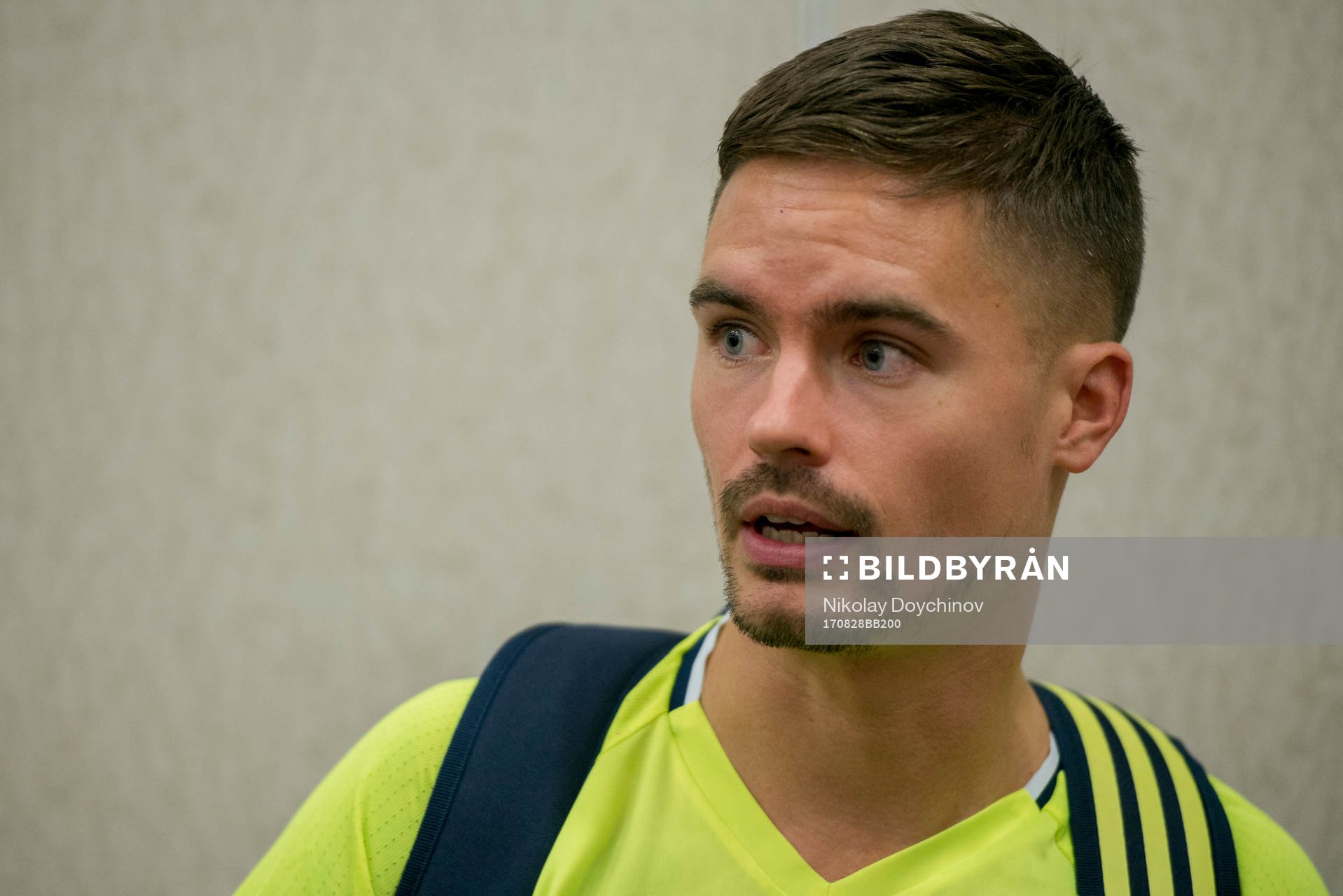 Swedish player Mikael Lustig meets media at a Mixed Zone