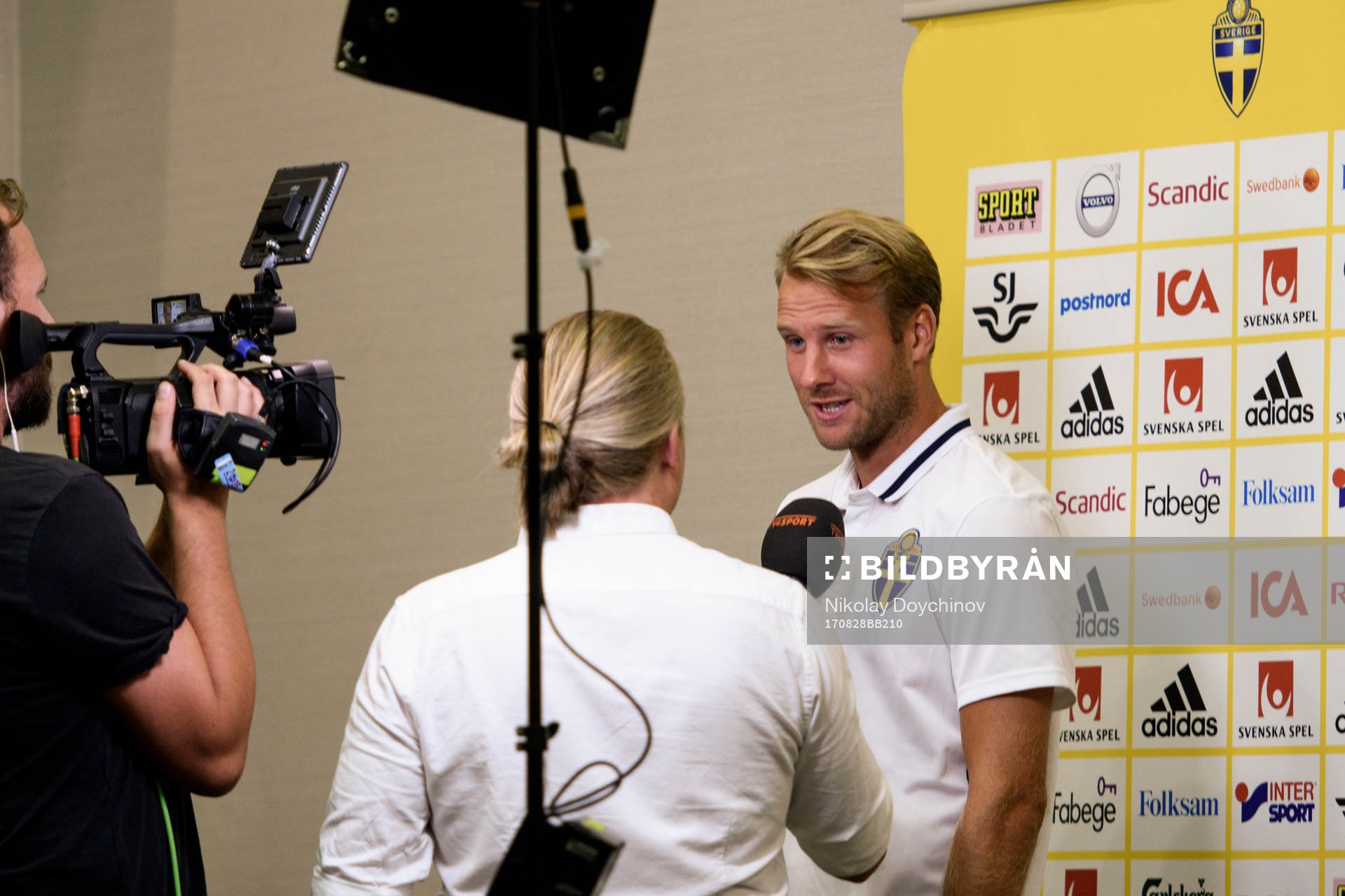 Swedish player Ola Toivonen meets media at a Mixed Zone