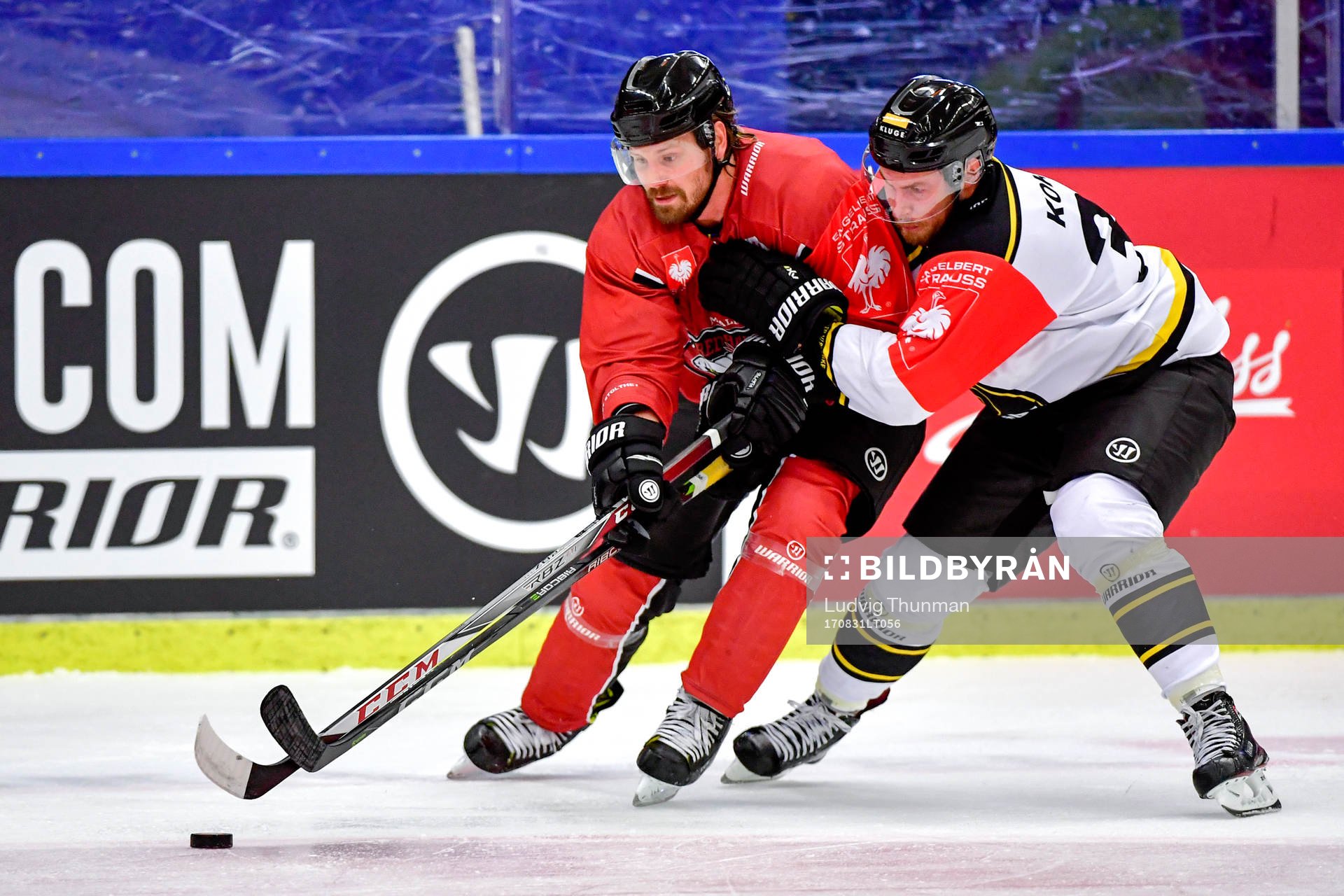 Stefan Warg of Malmö Redhawks and Lassi Kokkala of