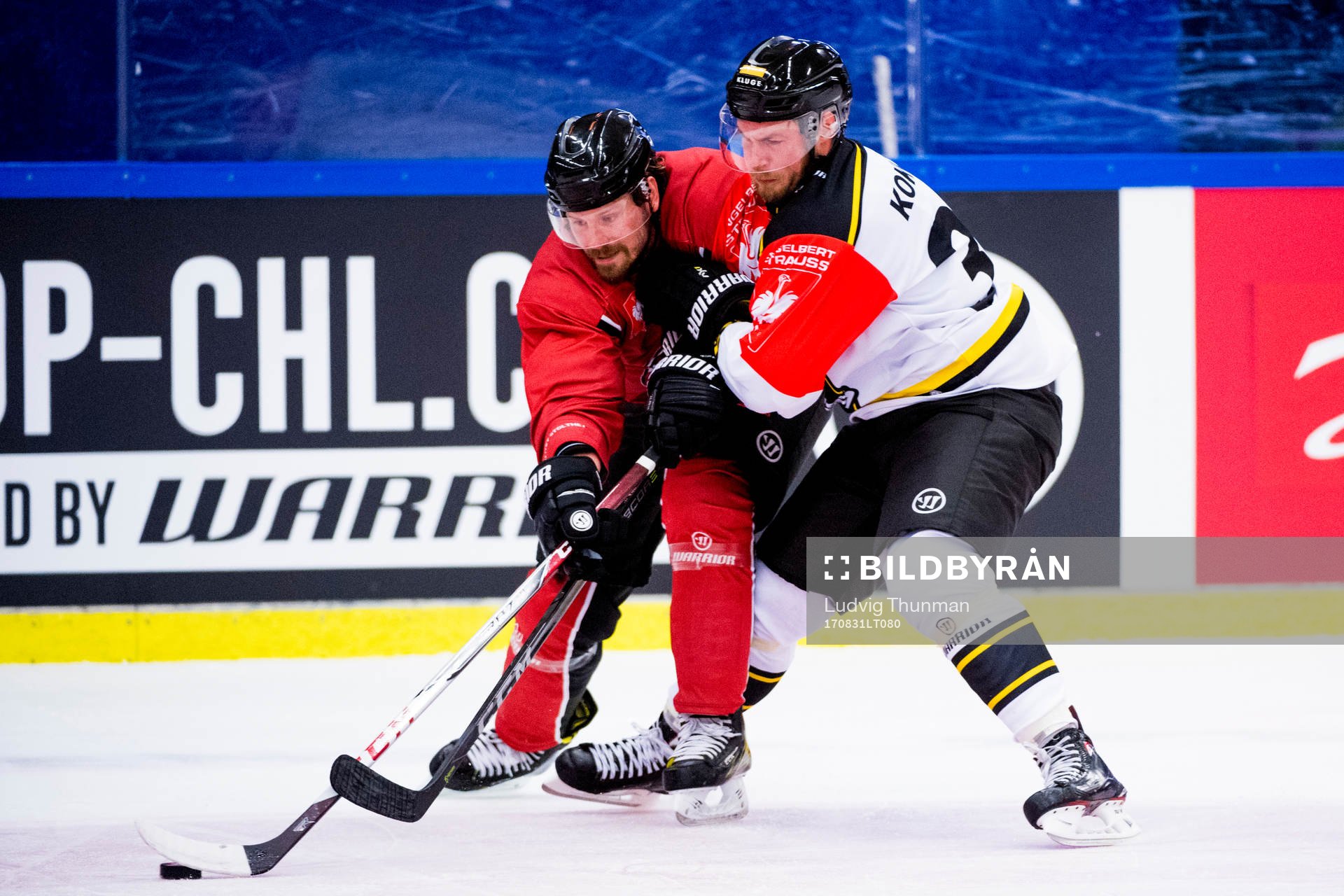 Stefan Warg of Malmö Redhawks and Lassi Kokkala of