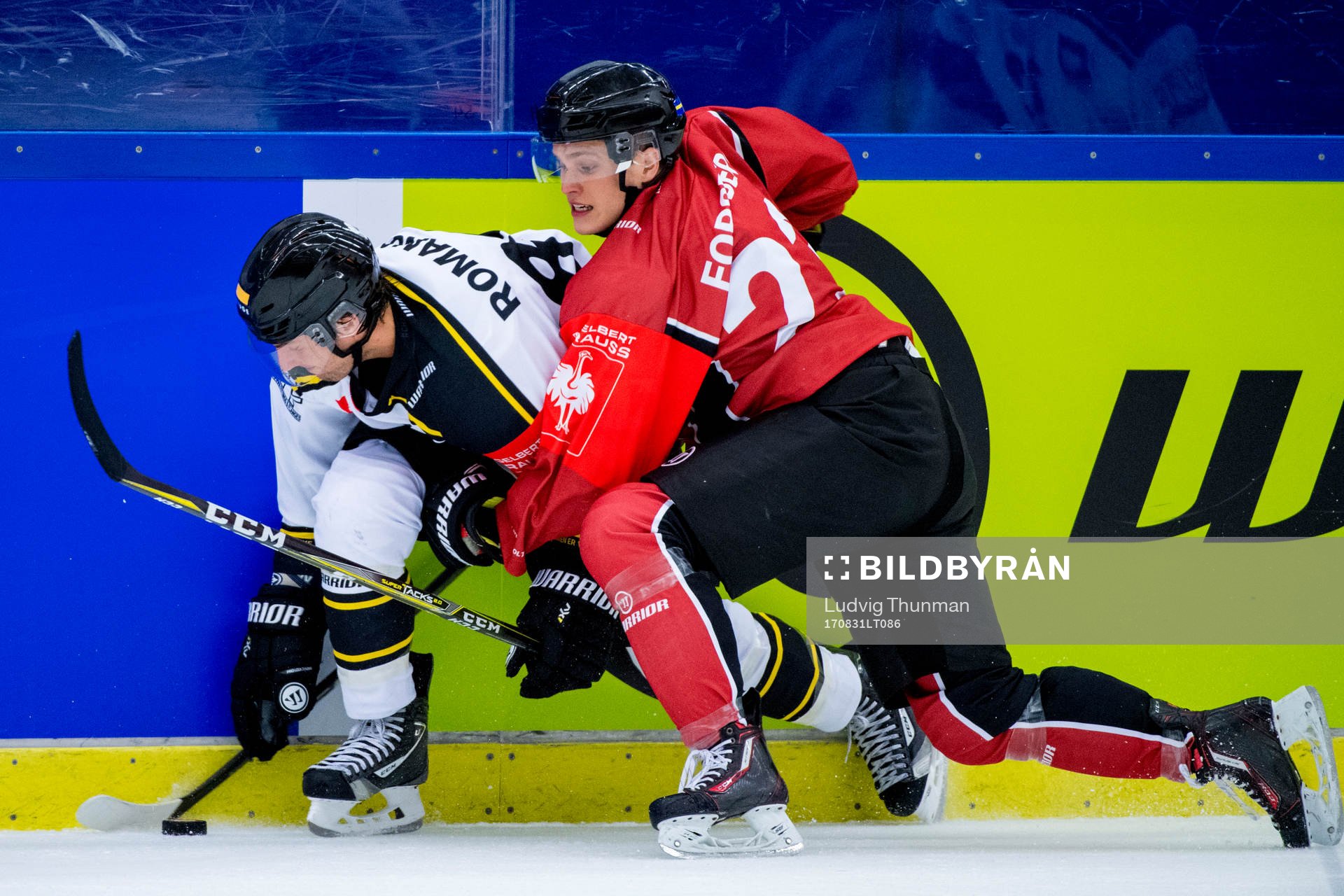 Tony Romano of Stavanger Oilers and Christoffer Forsberg of