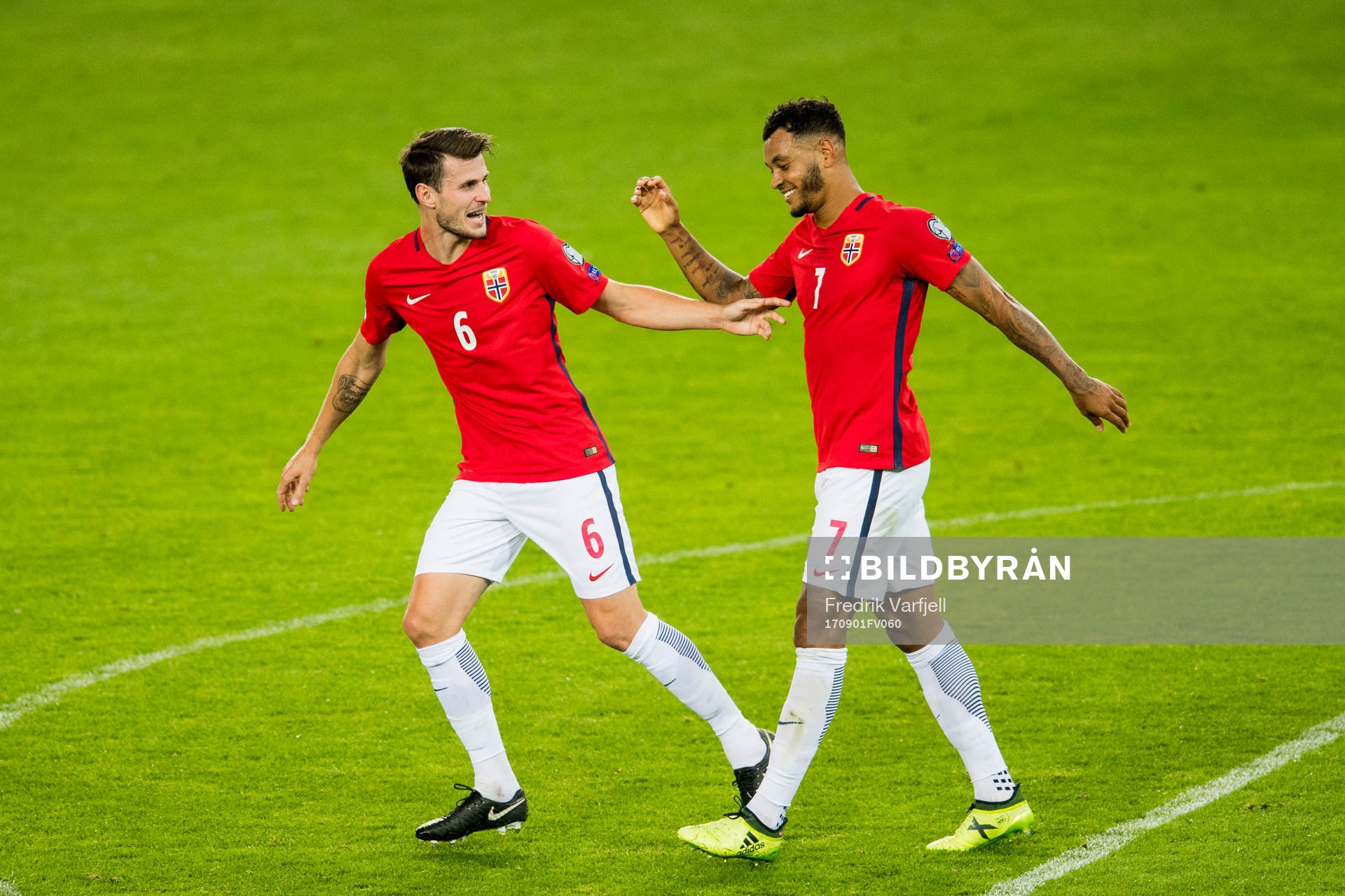 Håvard Nordtveit of Norway celebrates with Joshua King who