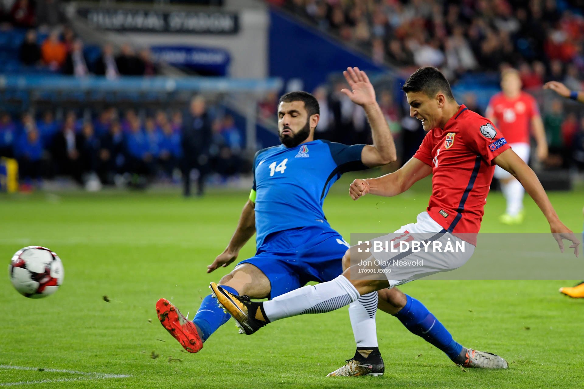 Rashad Sadygov of Azerbaijan throws himself to defend