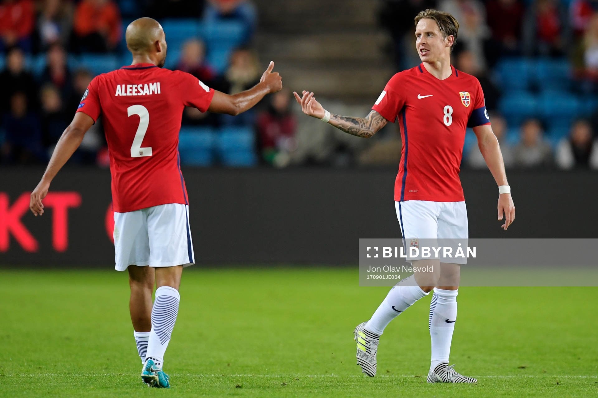 Haitam Aleesami and Stefan Johansen of Norway celebrate
