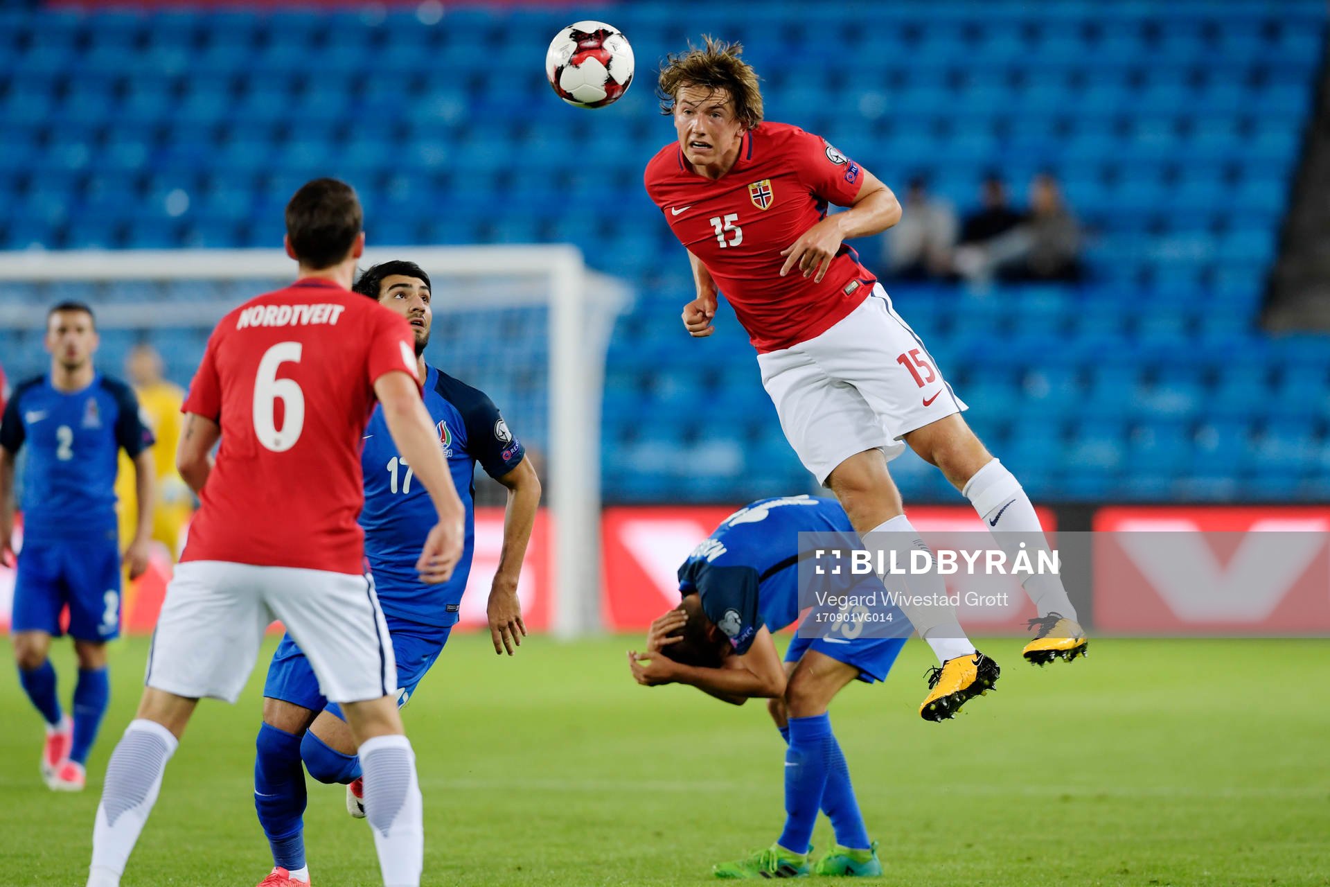Sander Berge of Norway with a header