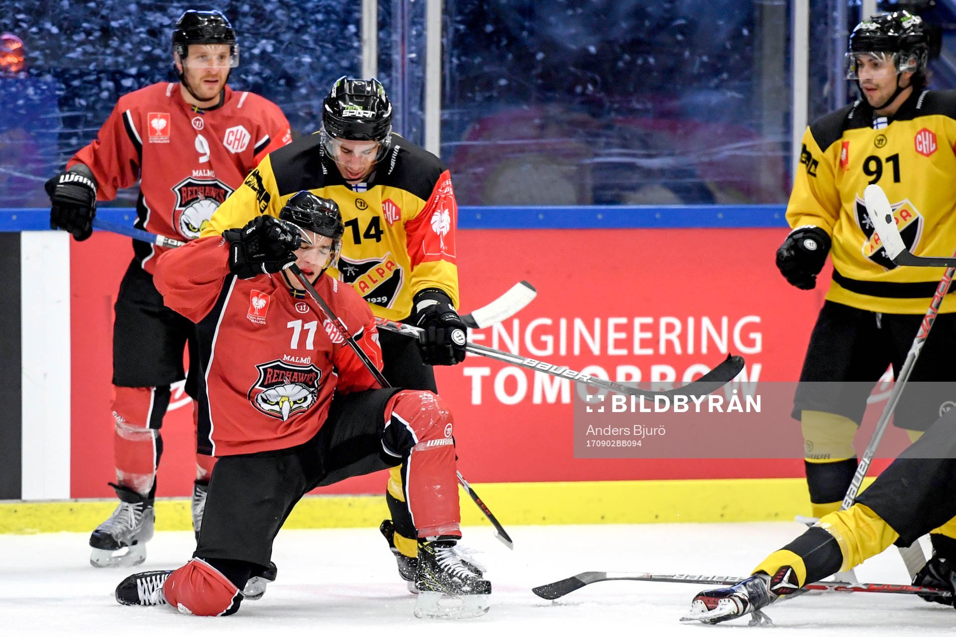 Lukas Haudum of Malmö Redhawks and Balazs Sebok of KalPa