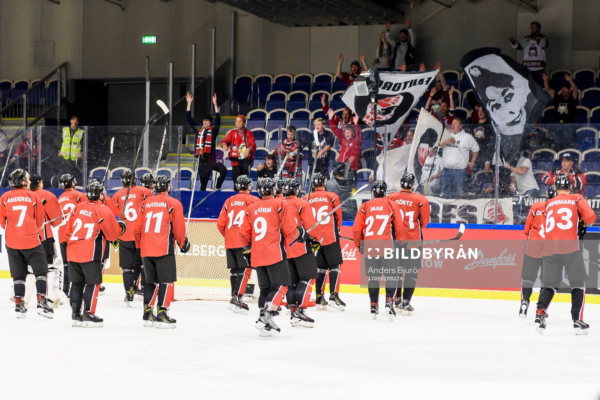 Malmö Redhawks players celebrate with the crowd