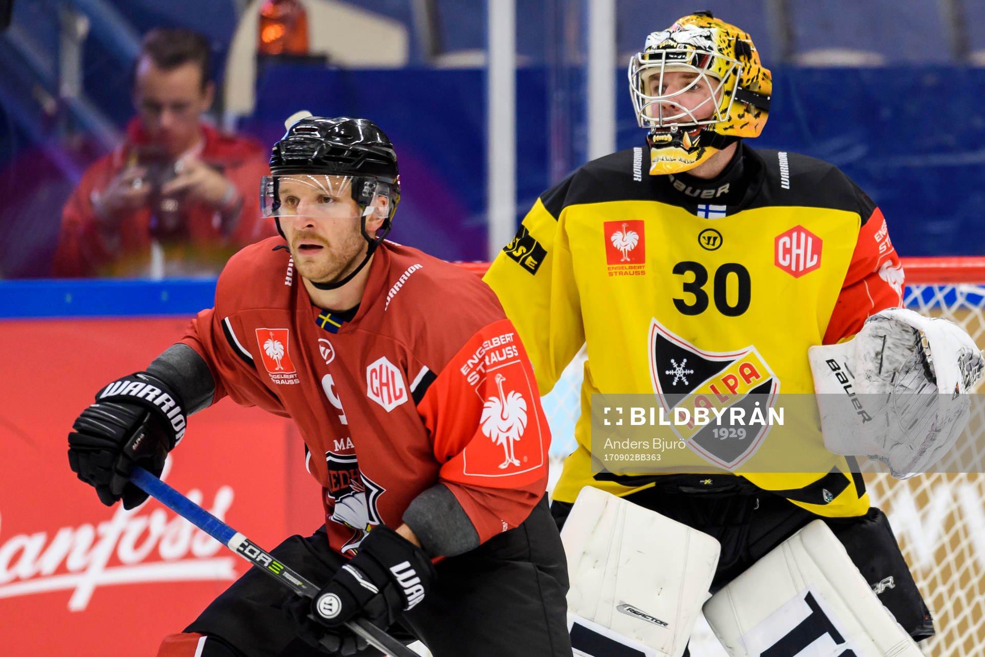 Frederik Storm of Malmö Redhawks and Goalkeeper Dennis