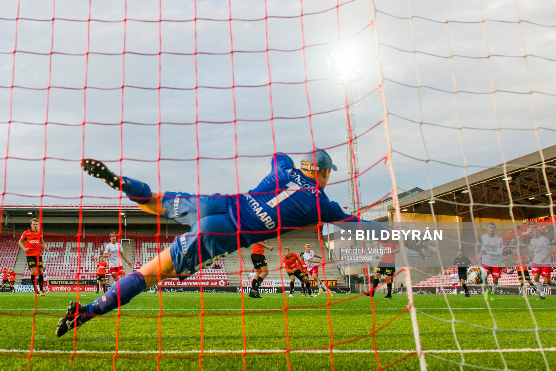 Filip Johansen Westgård of Fredrikstad scores 2-1 behind goalkeeper Eirik Østgaard of Åsane during the OBOS-ligaen match between Fredrikstad and Åsane on September 3, 2017 in Fredrikstad.
