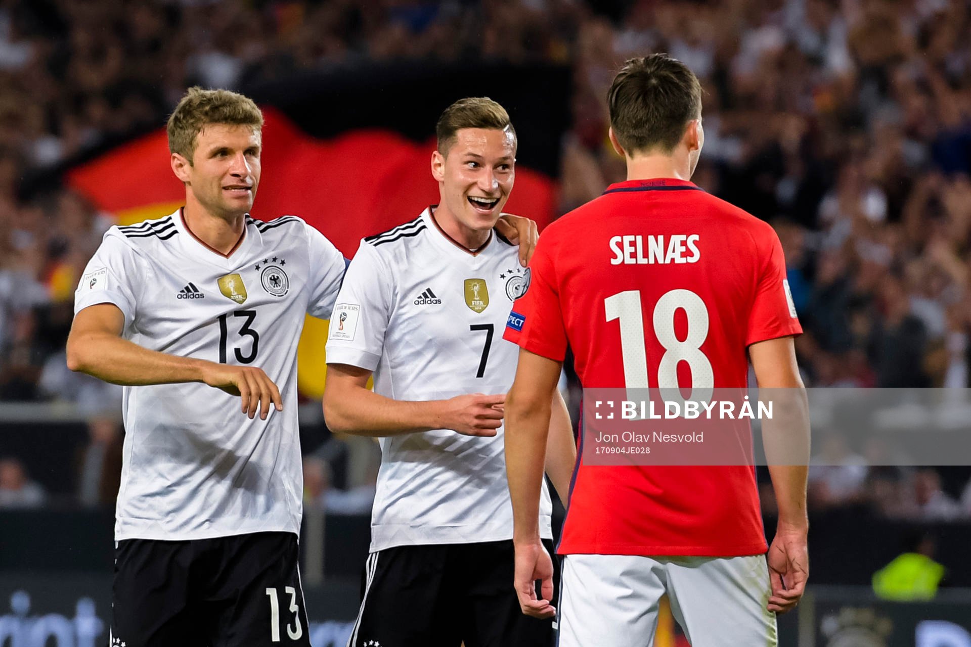 Thomas Müller and Julian Draxler of Germany celebrates the