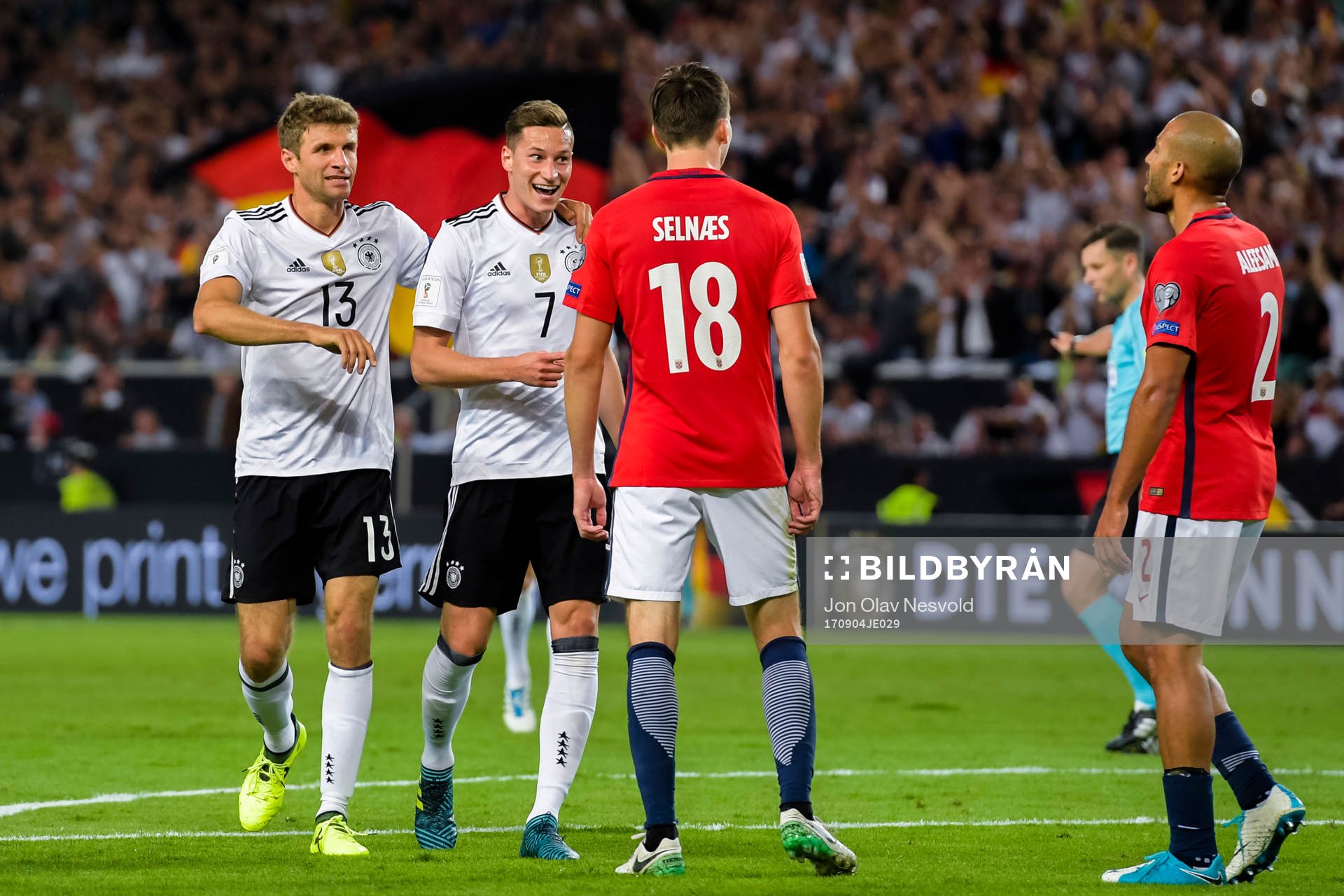 Thomas Müller and Julian Draxler of Germany celebrates the