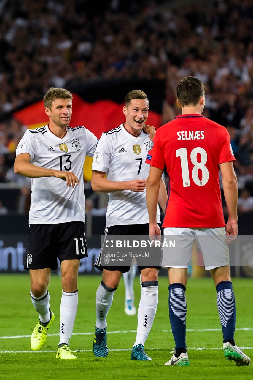 Thomas Müller and Julian Draxler of Germany celebrates the